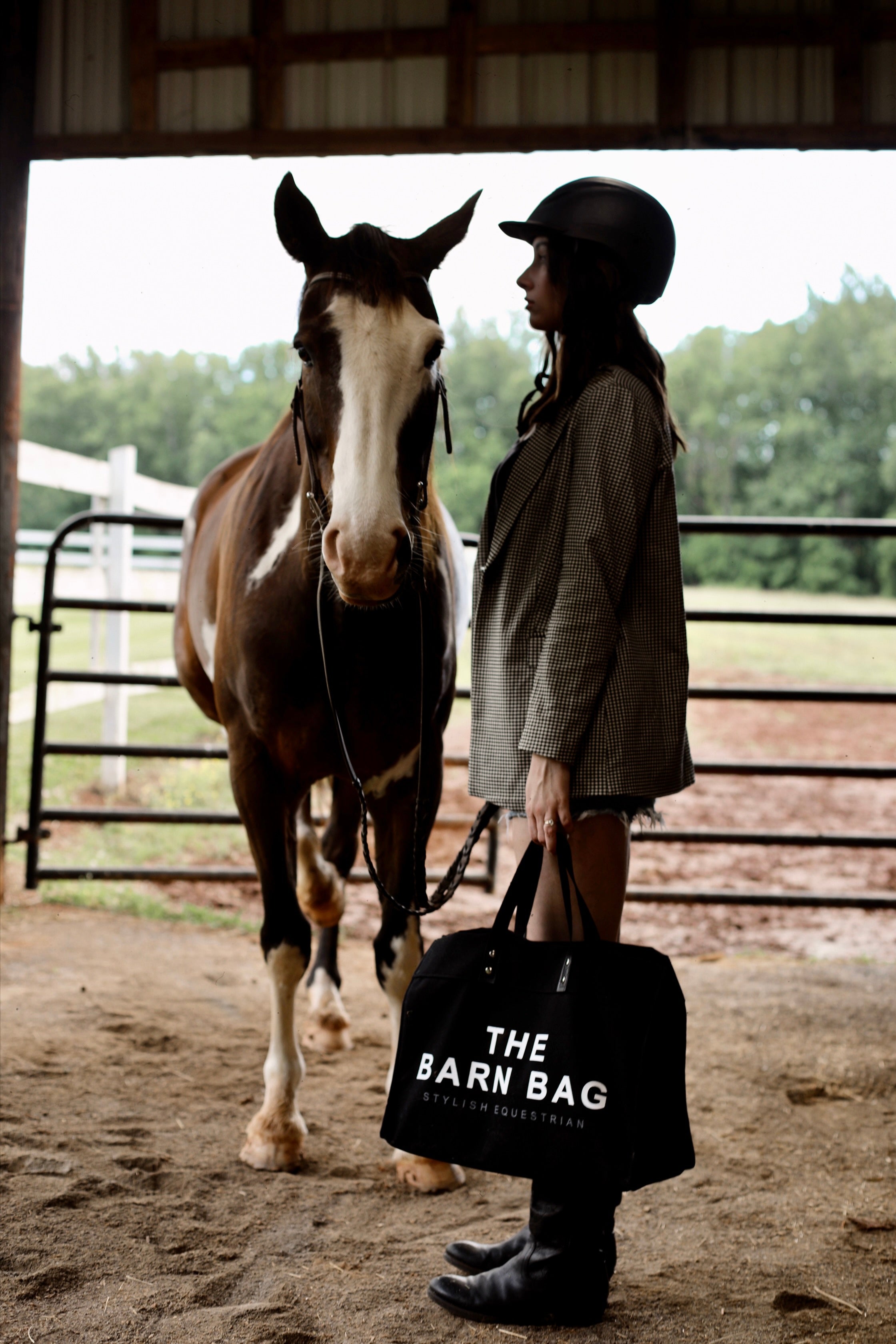 stylish equestrian the barn bag canvas tote The Barn Bag Tote by Stylish Equestrian — durable canvas carry-all featuring cheeky front print, genuine leather handles, and two interior side pockets perfectly sized for a champagne bottle. Made in the USA, this equestrian-inspired tote is the ultimate barn and horse show essential.