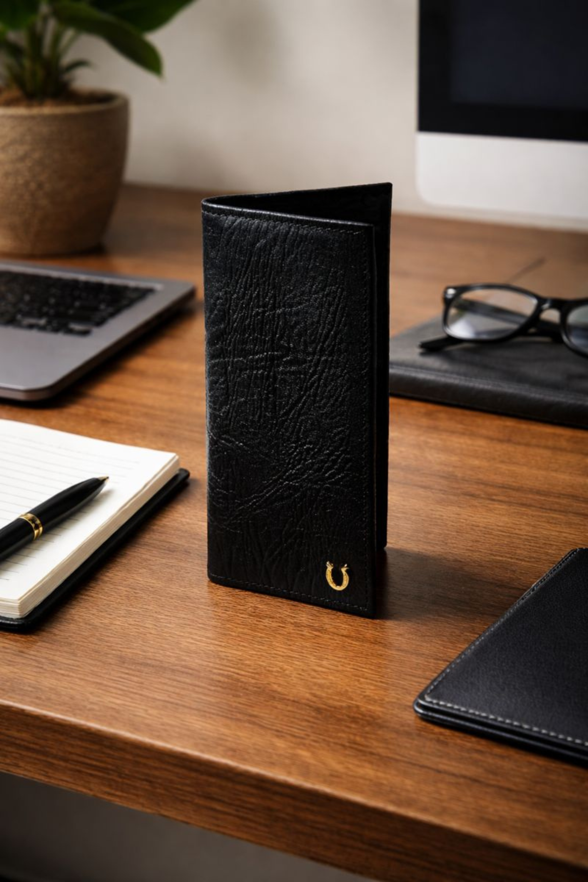 Compact textured leather wallet featuring gold metal hardware, multiple card slots, bill pockets