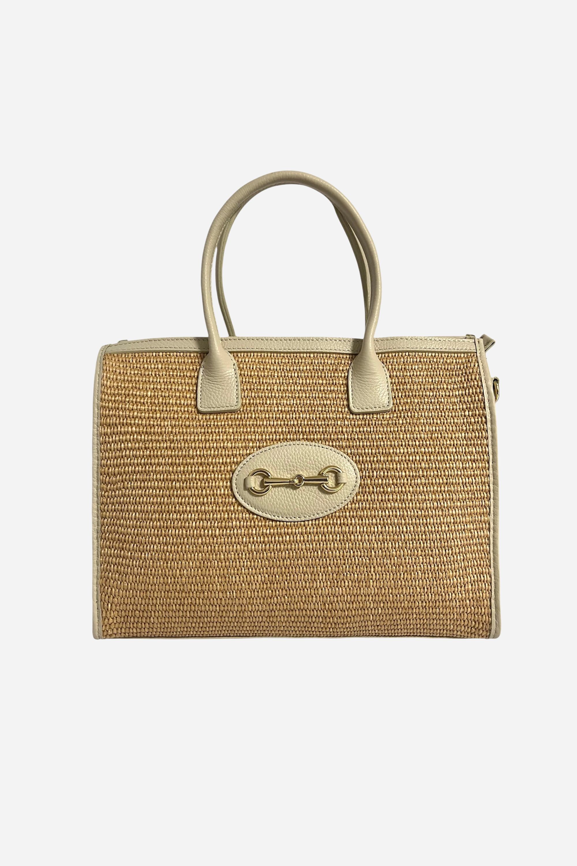 Raffia and leather horsebit shopper tote with adjustable shoulder strap and zip closure, equestrian-inspired everyday handbag.