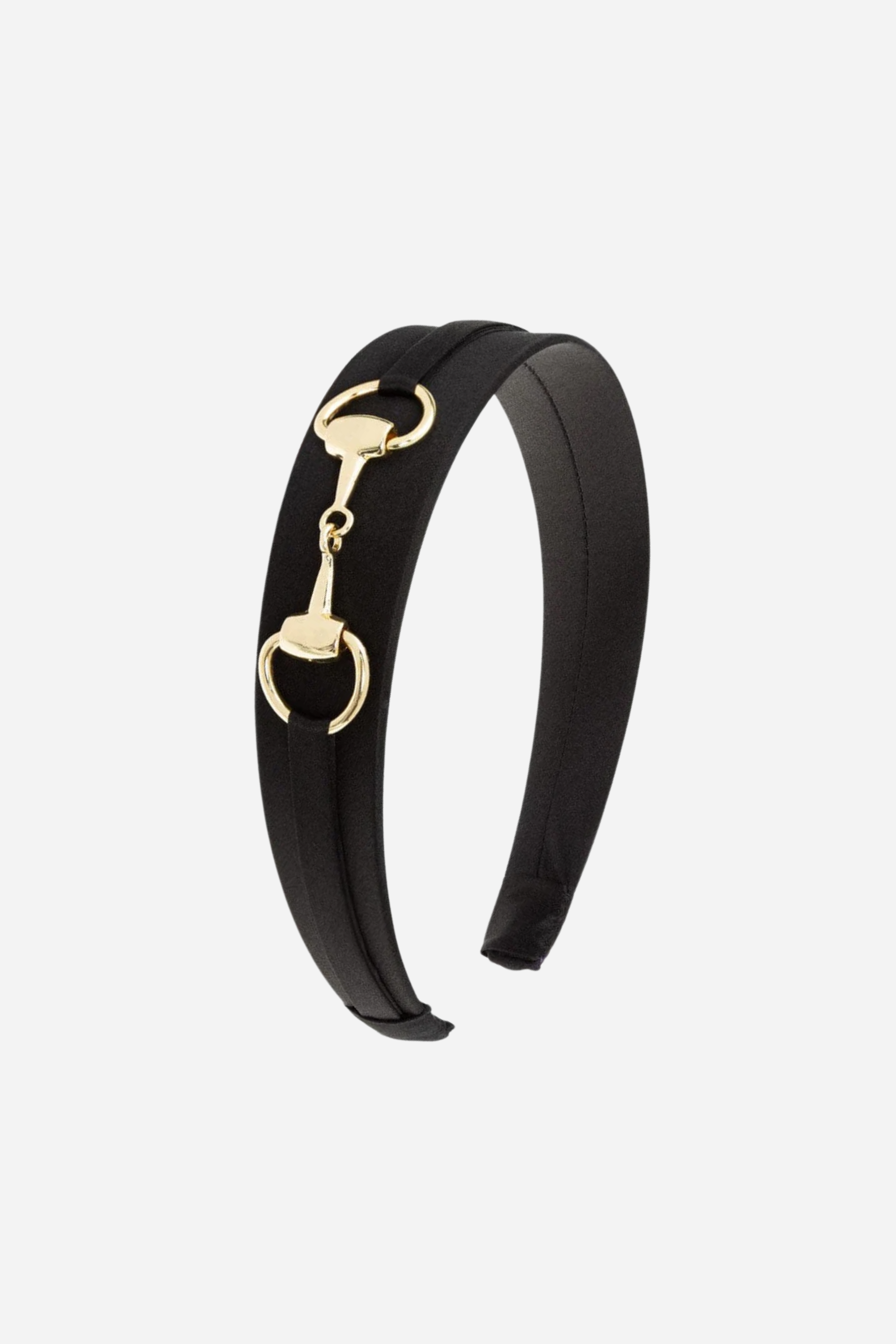Elegant black silk charmeuse headband adorned with a gleaming gold snaffle bit detail. A timeless, equestrian-inspired accessory designed for comfort and all-day wear.