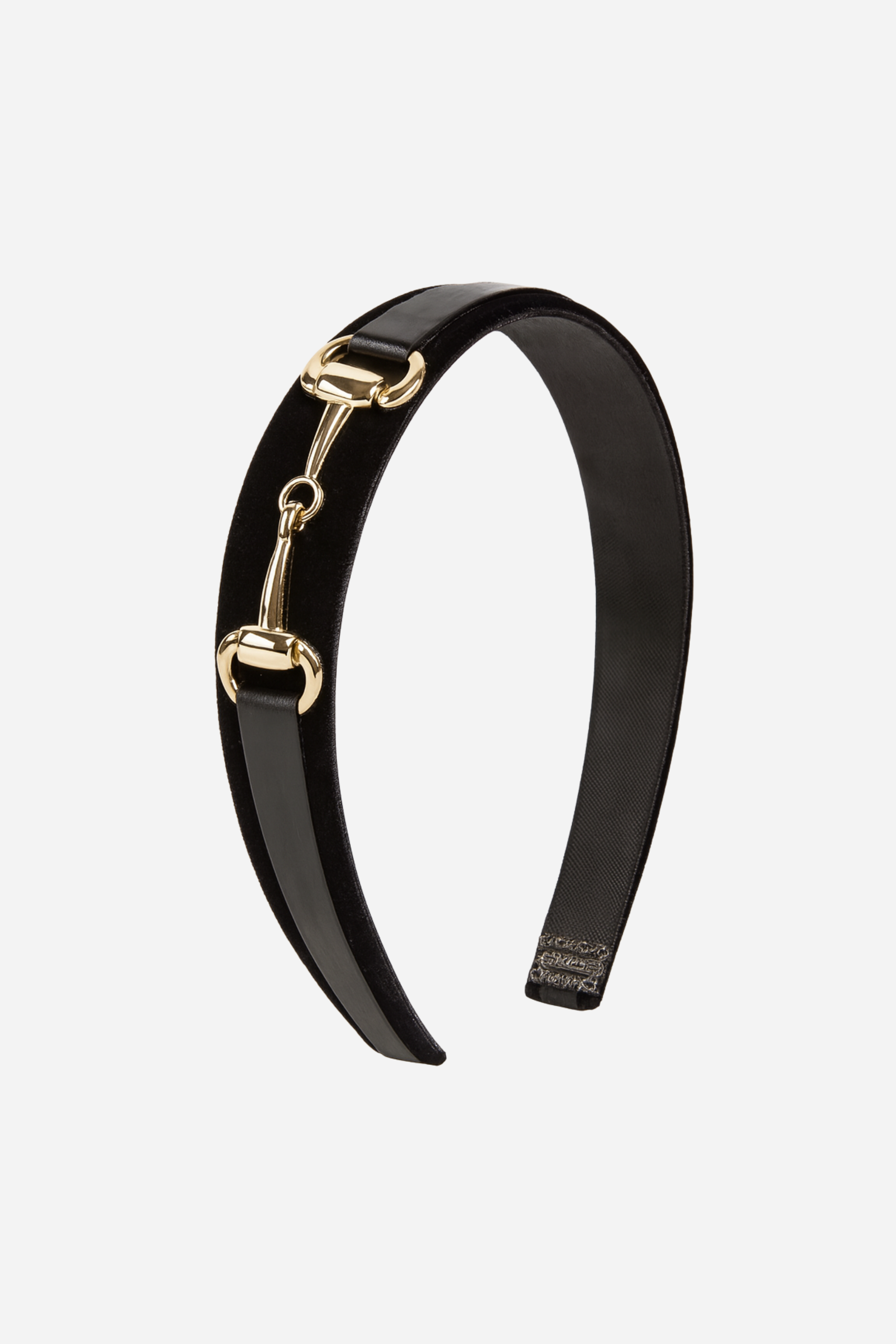 Black headband with gold accents on a white background -Equestrian headband, Snaffle bit headband, Black and gold hair accessory, Women’s equestrian fashion, Horse bit headband, Stylish hair accessories, Classic black headband, Equestrian-inspired style, Everyday chic accessories, Elegant gold detail headband