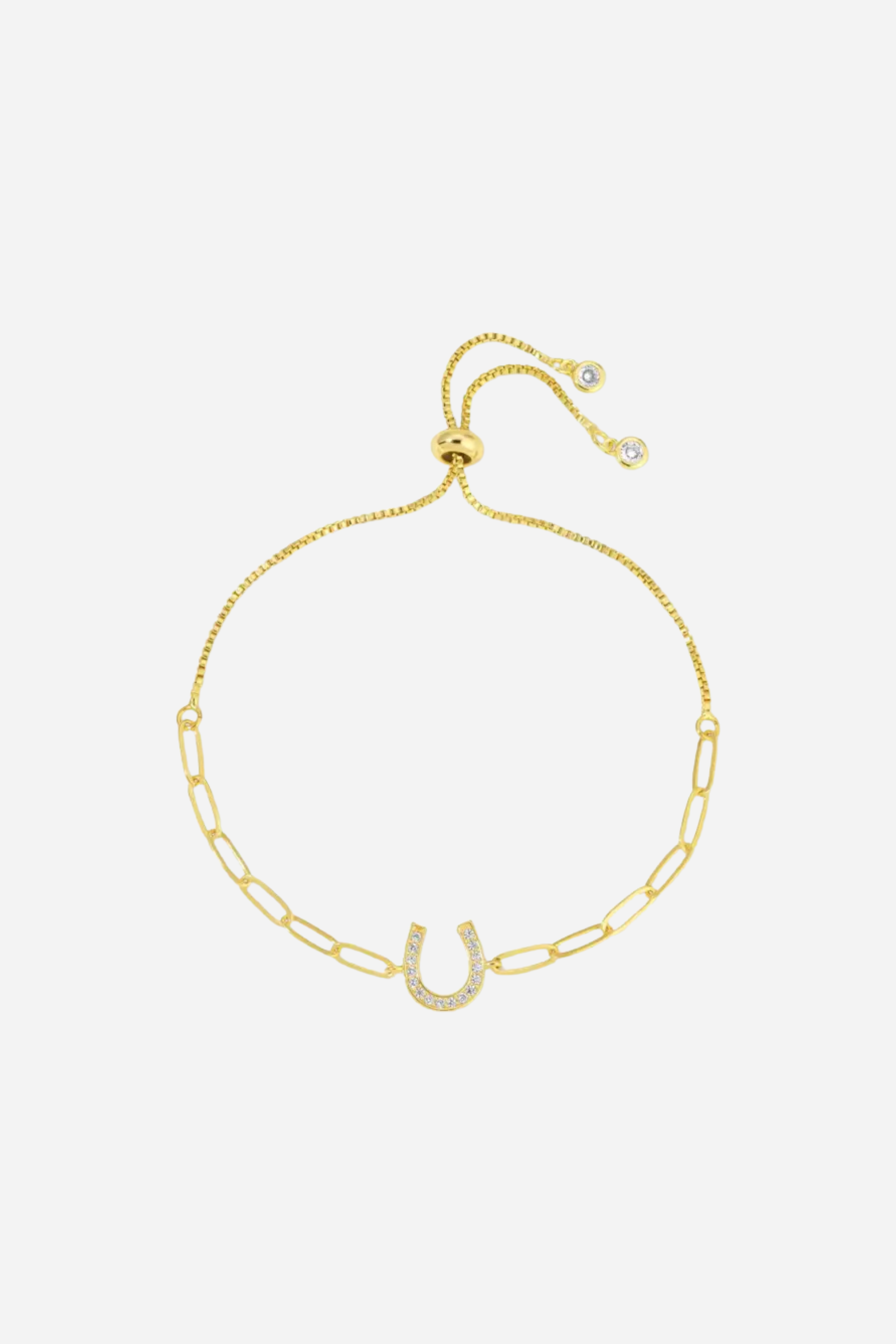 Gold bracelet with a horseshoe charm on a white background - equestrian inspired jewelry, horse girl accessory, horseshoe bracelet, dainty equestrian jewelry, meaningful gifts for horse lover