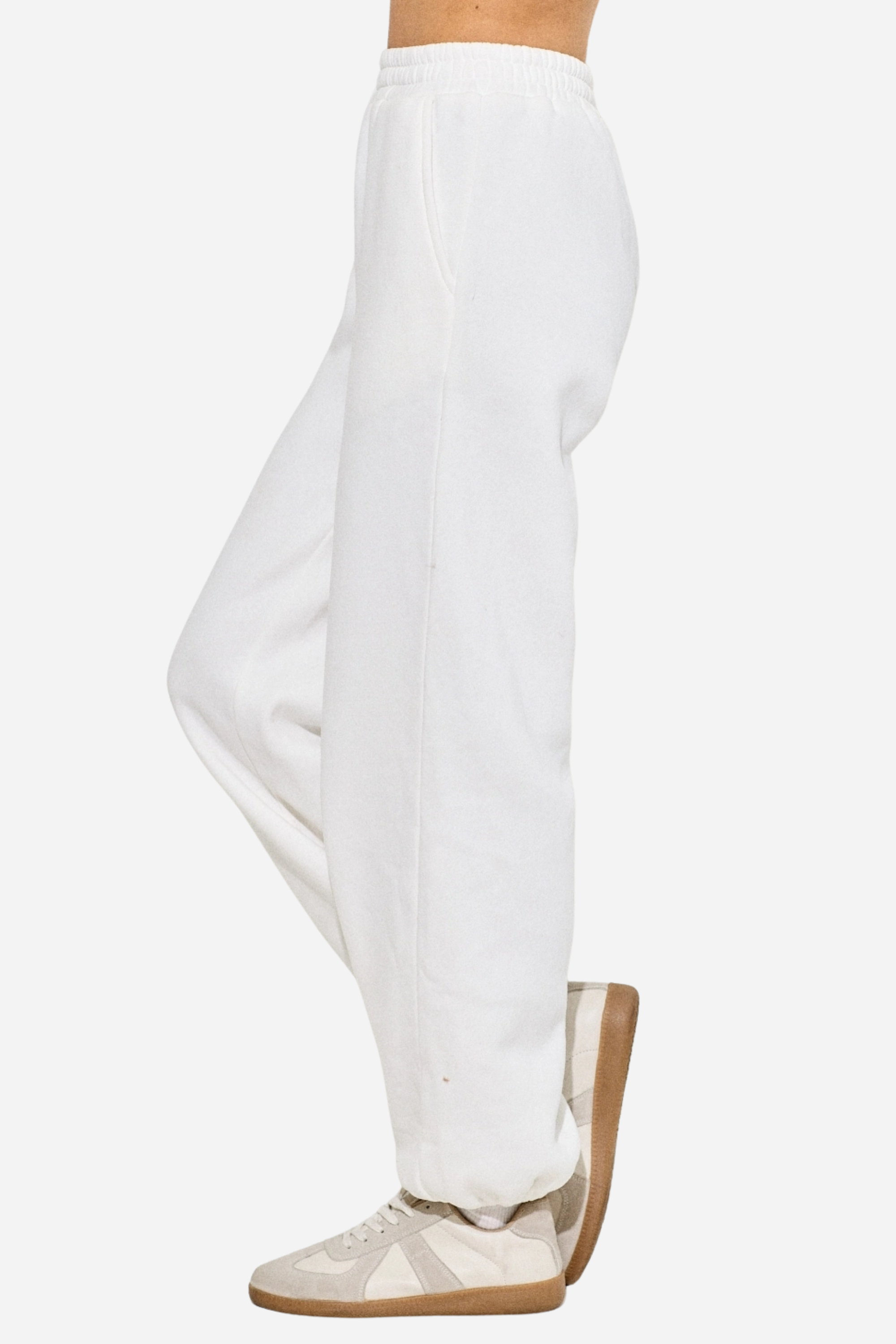 Cowgirl Ski Club Embroidered Sweatpant — ultra-soft fleece jogger-style pants blending western flair with après-ski charm. Features a powder-blue embroidered cowgirl graphic on the front right leg, elastic waistband, two side slit pockets, and a back pocket for comfort and style. Perfect cozy bottoms for horse girls and western fashion lovers. western cowgirl embroidery detail, horse girl apparel, equestrian clothing, western riding sweatpants, skiing cowgirl loungewear, cozy fleece joggers