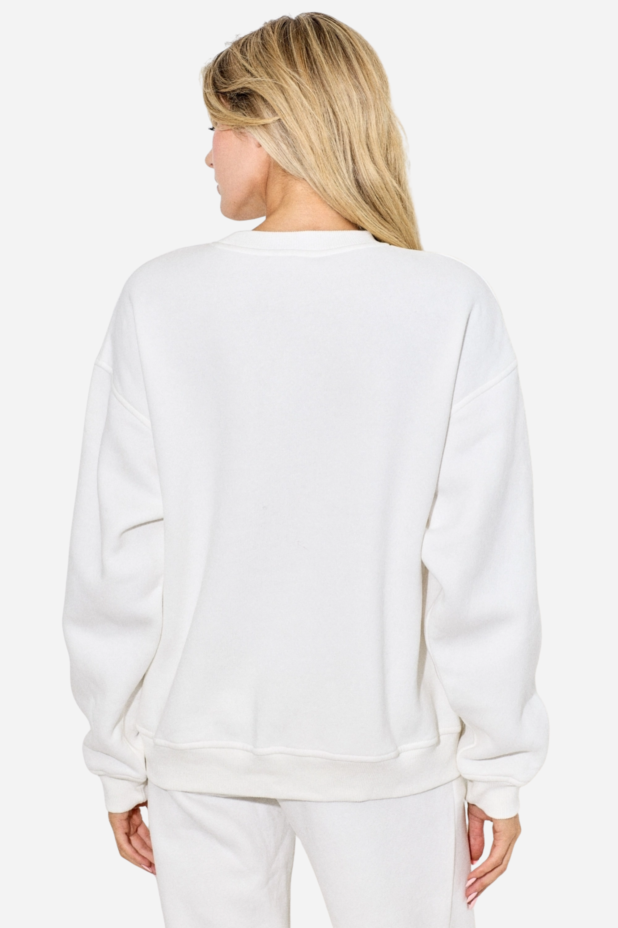 Cowgirl Ski Club Embroidered Sweatshirt — a cozy fleece pullover blending western charm with après-ski flair. Features a powder-blue embroidered skiing cowgirl graphic on soft cotton/poly fabric with ribbed cuffs, neckline, and hem. Relaxed fit for ultimate comfort and style, perfect for horse girls and western fashion lovers. western cowgirl embroidery detail, horse girl apparel, equestrian clothing, western riding sweatshirt, skiing cowgirl sweatshirt, cozy fleece pullover