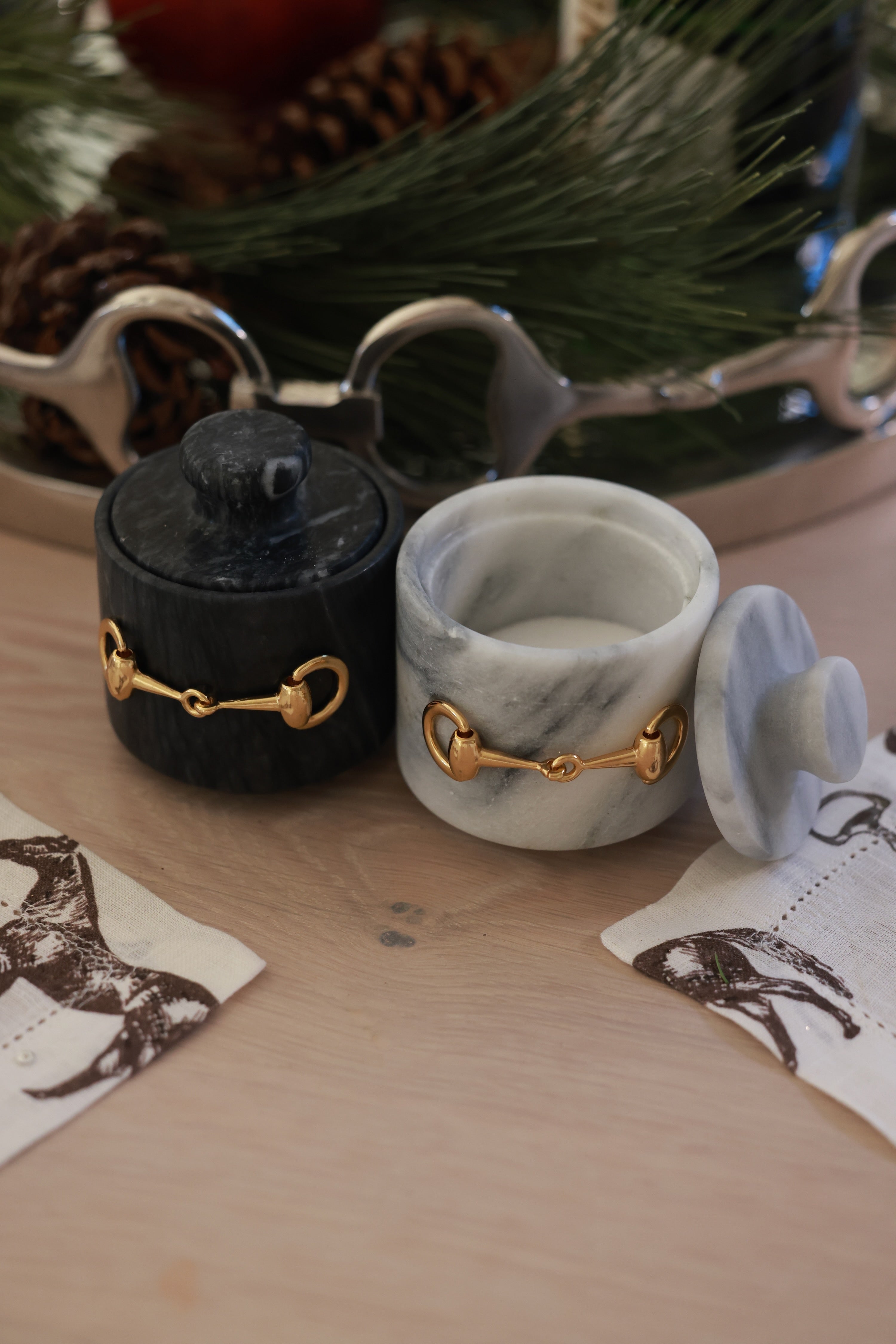 Elegant white marble D-ring salt cellar with gold hardware and matching lid, handcrafted for an equestrian-inspired kitchen. The round marble container features a sleek matte finish and natural veining, perfect for storing gourmet salts, spices, or herbs while adding sophisticated horse-themed decor to any table or countertop.