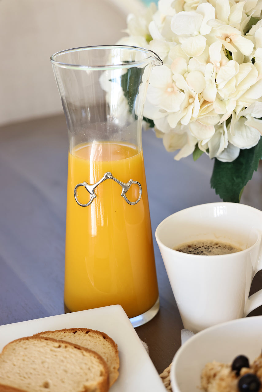 arthur court stylish equestrian dawson horse bit carafe Dawson Carafe by Arthur Court featuring a 28 oz clear glass body accented with a crafted pewter horse bit. A sophisticated equestrian-inspired carafe designed to enhance beverages and elevate any table setting.
