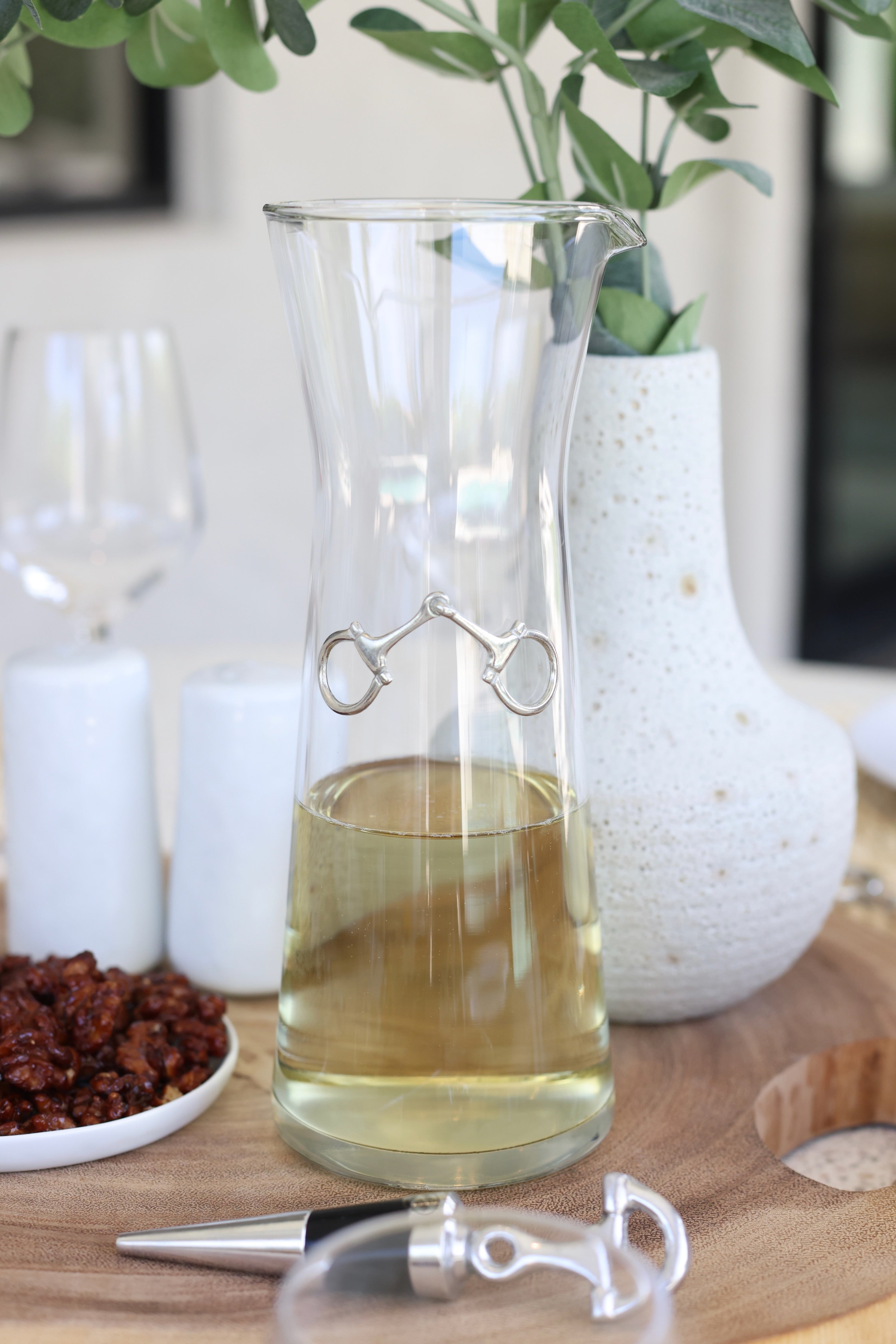arthur court stylish equestrian dawson horse bit carafe Dawson Carafe by Arthur Court featuring a 28 oz clear glass body accented with a crafted pewter horse bit. A sophisticated equestrian-inspired carafe designed to enhance beverages and elevate any table setting.