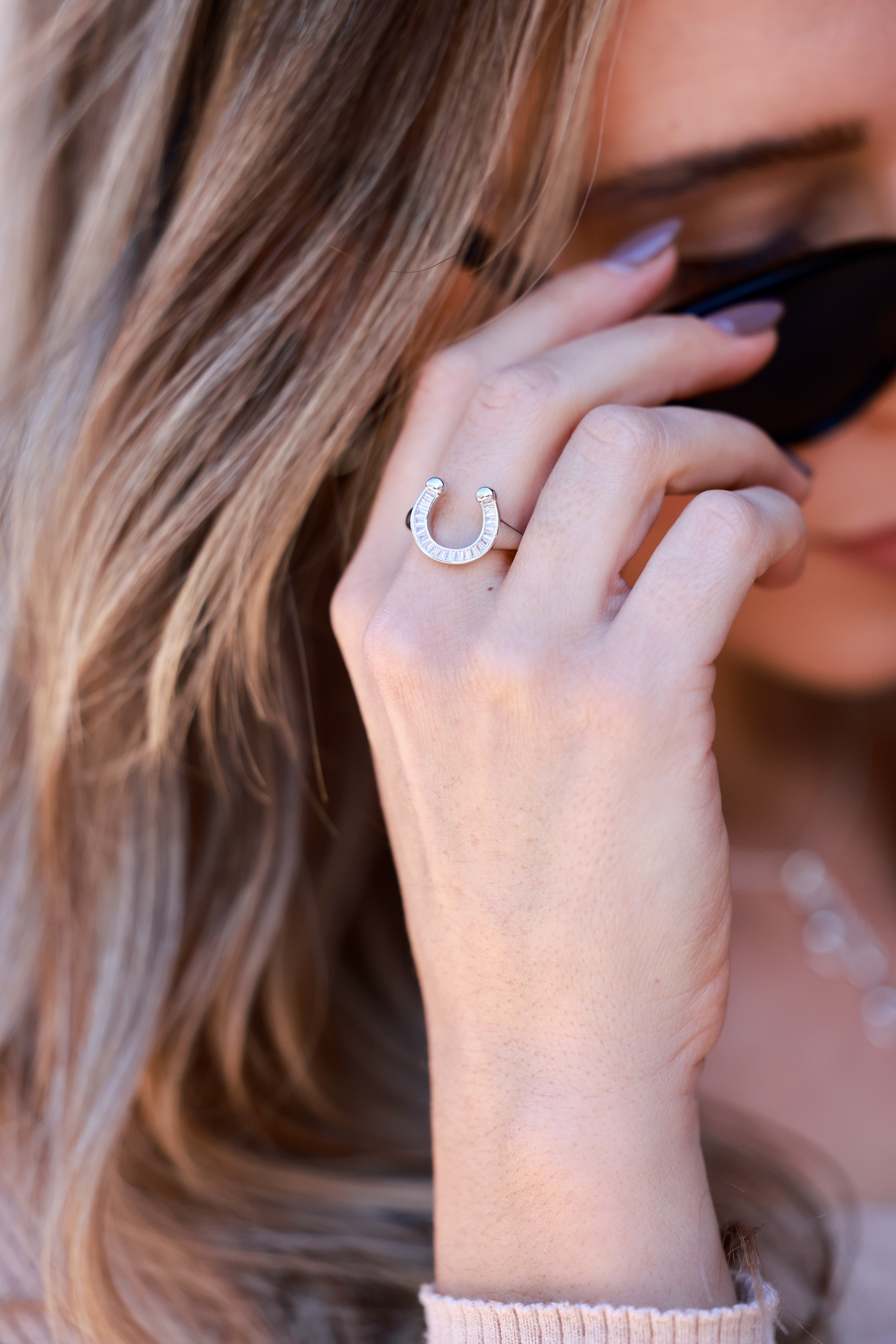 Devon Horseshoe Signet Ring in 18k gold-plated stainless steel with CZ accents. Water- and tarnish-resistant, hypoallergenic equestrian ring offering a chic, modern twist on the classic horseshoe design — perfect gift for horse lovers.