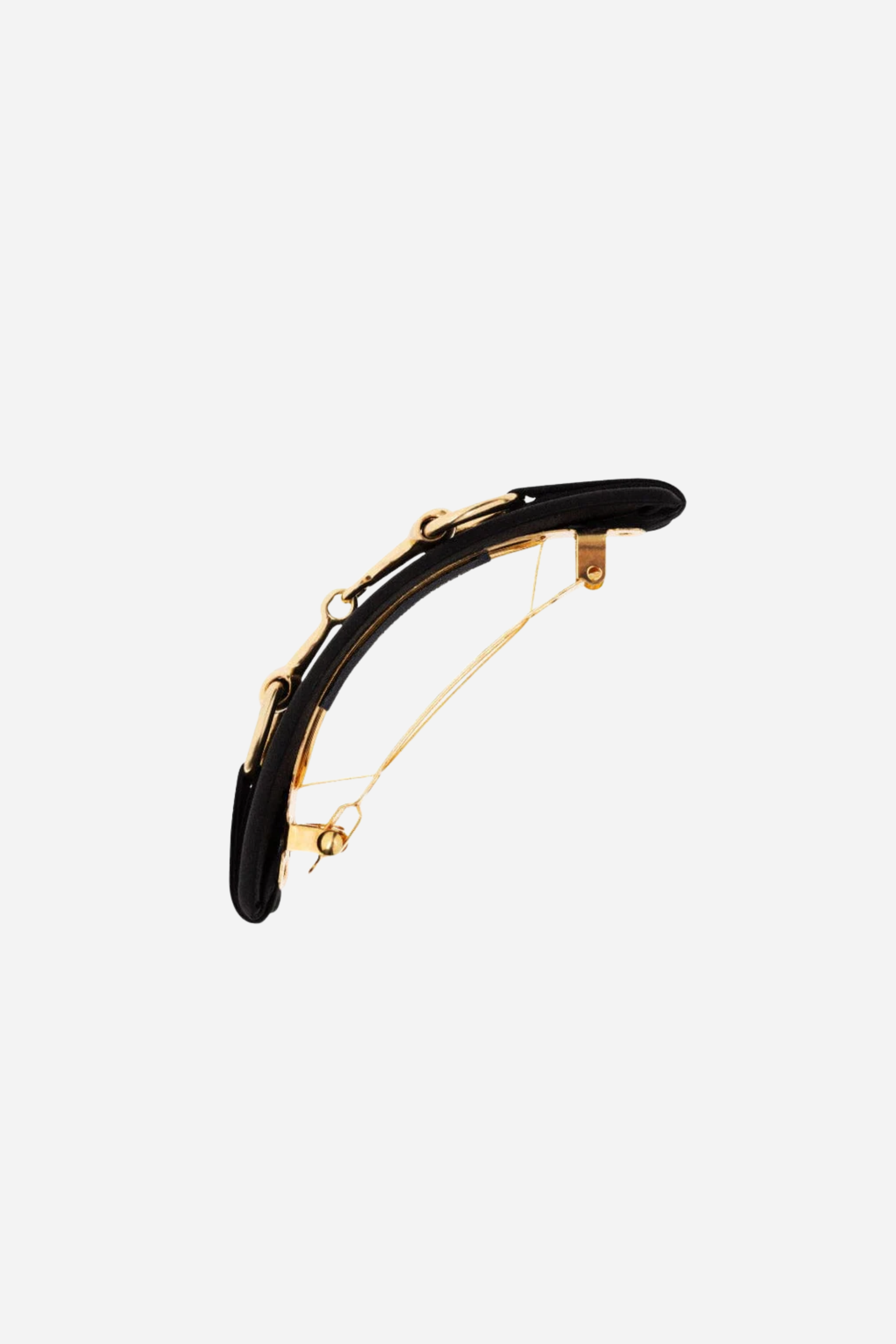 Black Hattie Bit Silk Barrette handcrafted in 100% silk charmeuse, featuring a large gold snaffle bit detail and sturdy clasp for thick hair. Elegant equestrian-inspired accessory that adds everyday chic and timeless sophistication to any hairstyle.