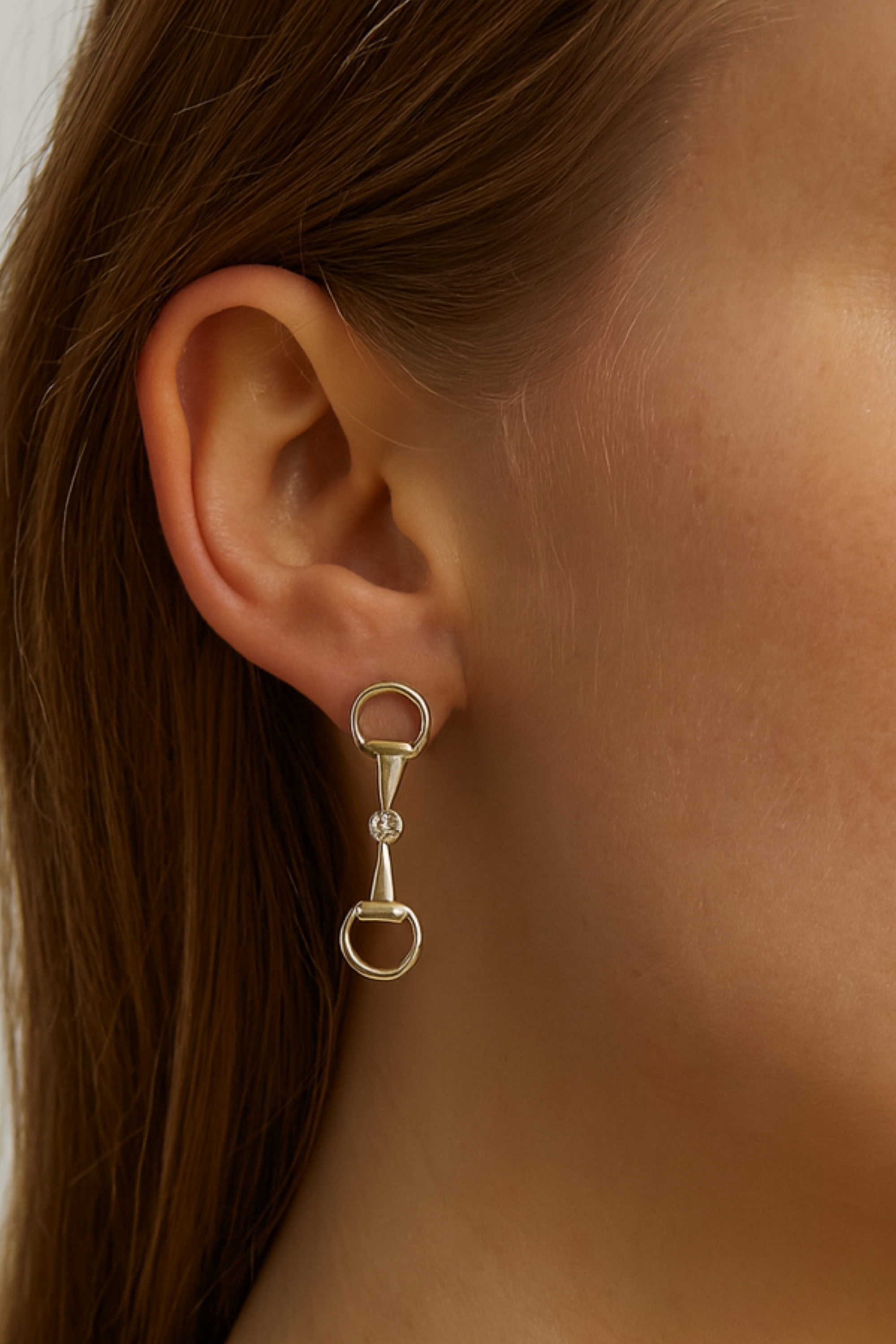 Silver equestrian bit drop earrings with crystal accents, lightweight horse girl jewelry, dainty CZ stud earrings, elegant gift for equestrian lovers.