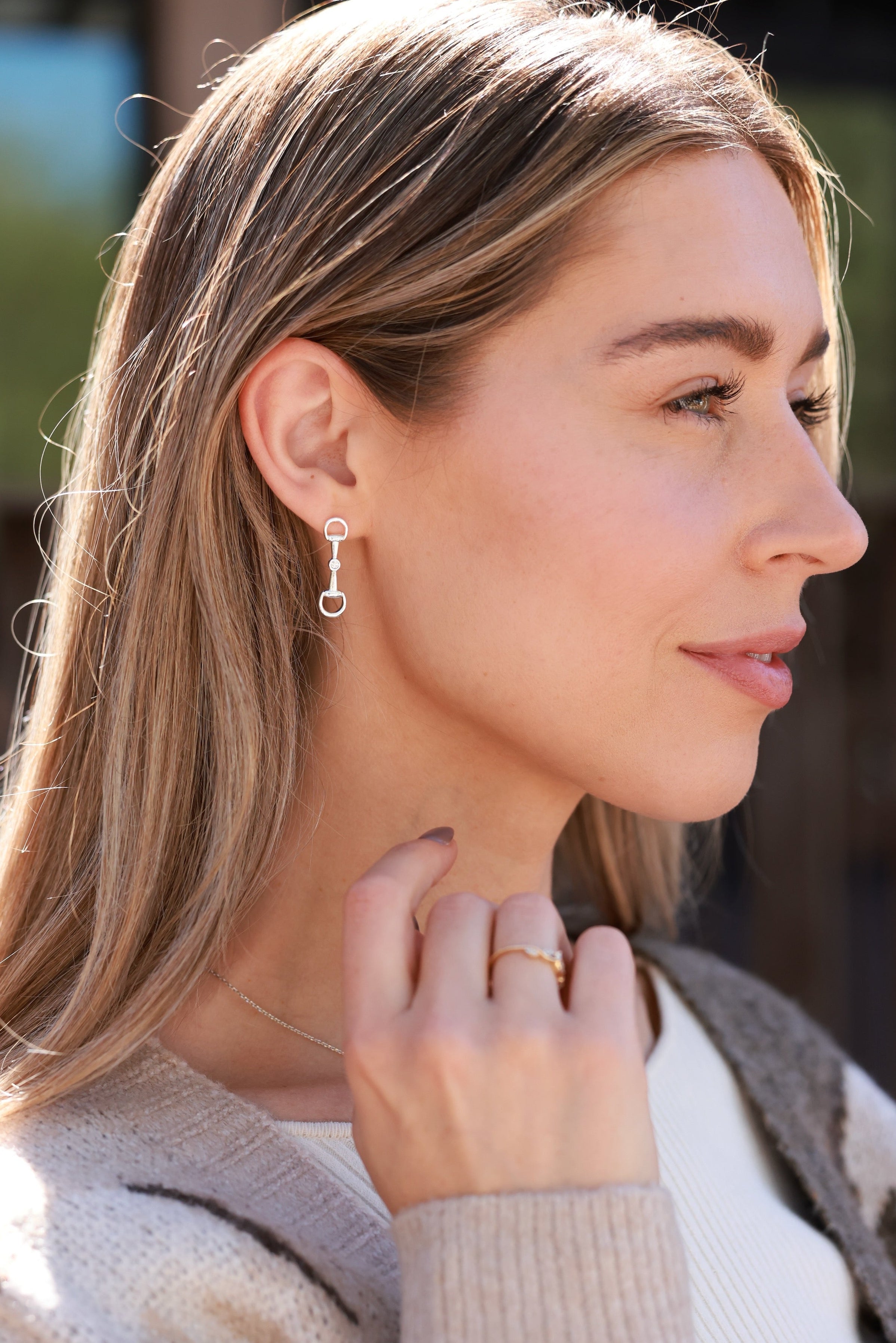 Silver equestrian bit drop earrings with crystal accents, lightweight horse girl jewelry, dainty CZ stud earrings, elegant gift for equestrian lovers.