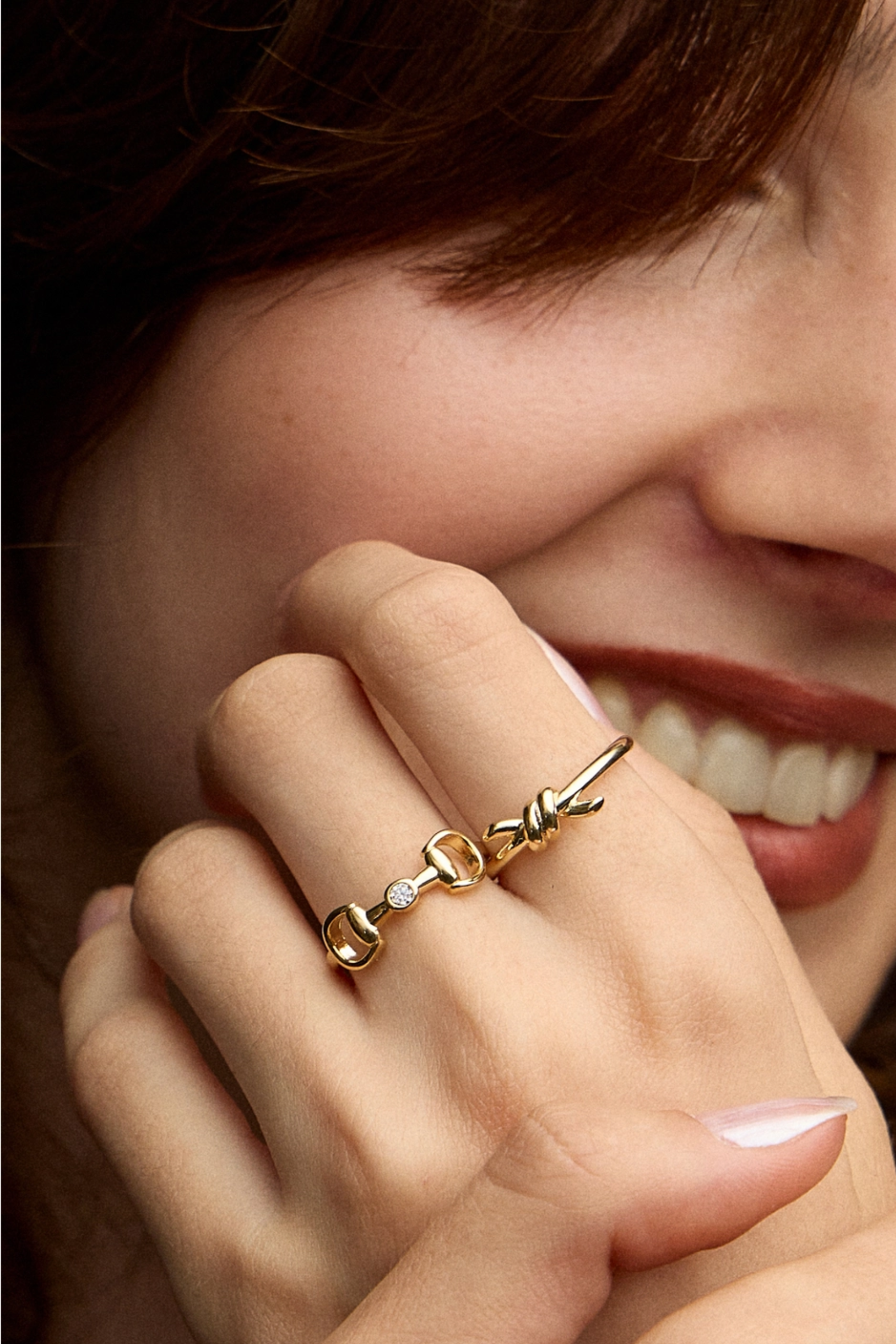 18k gold-plated equestrian horse bit ring with a bezel-set crystal accent, designed as a refined everyday statement piece.