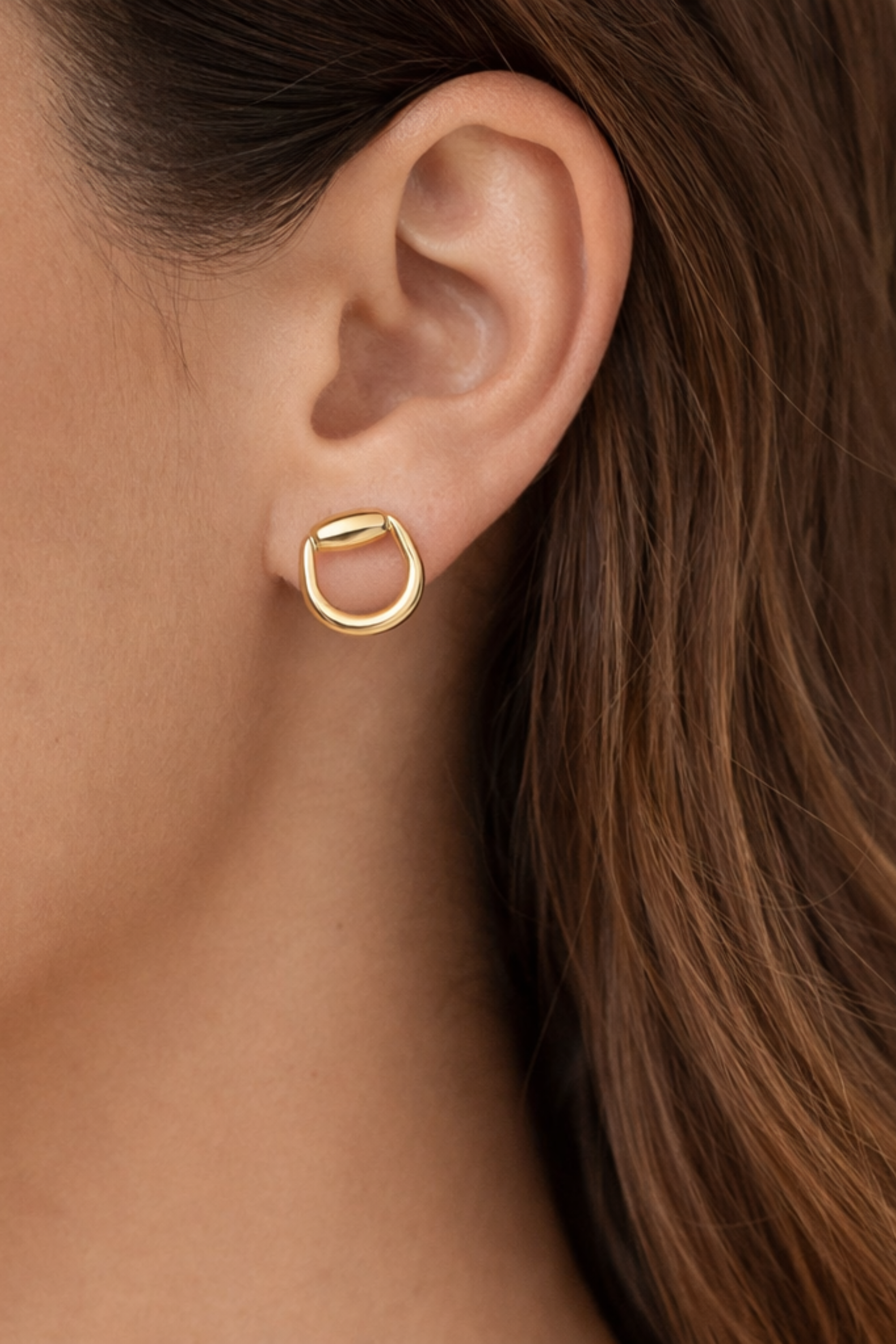 18k gold plated Hollis bit stud earrings with a minimalist half snaffle horse bit design, lightweight everyday equestrian jewelry.