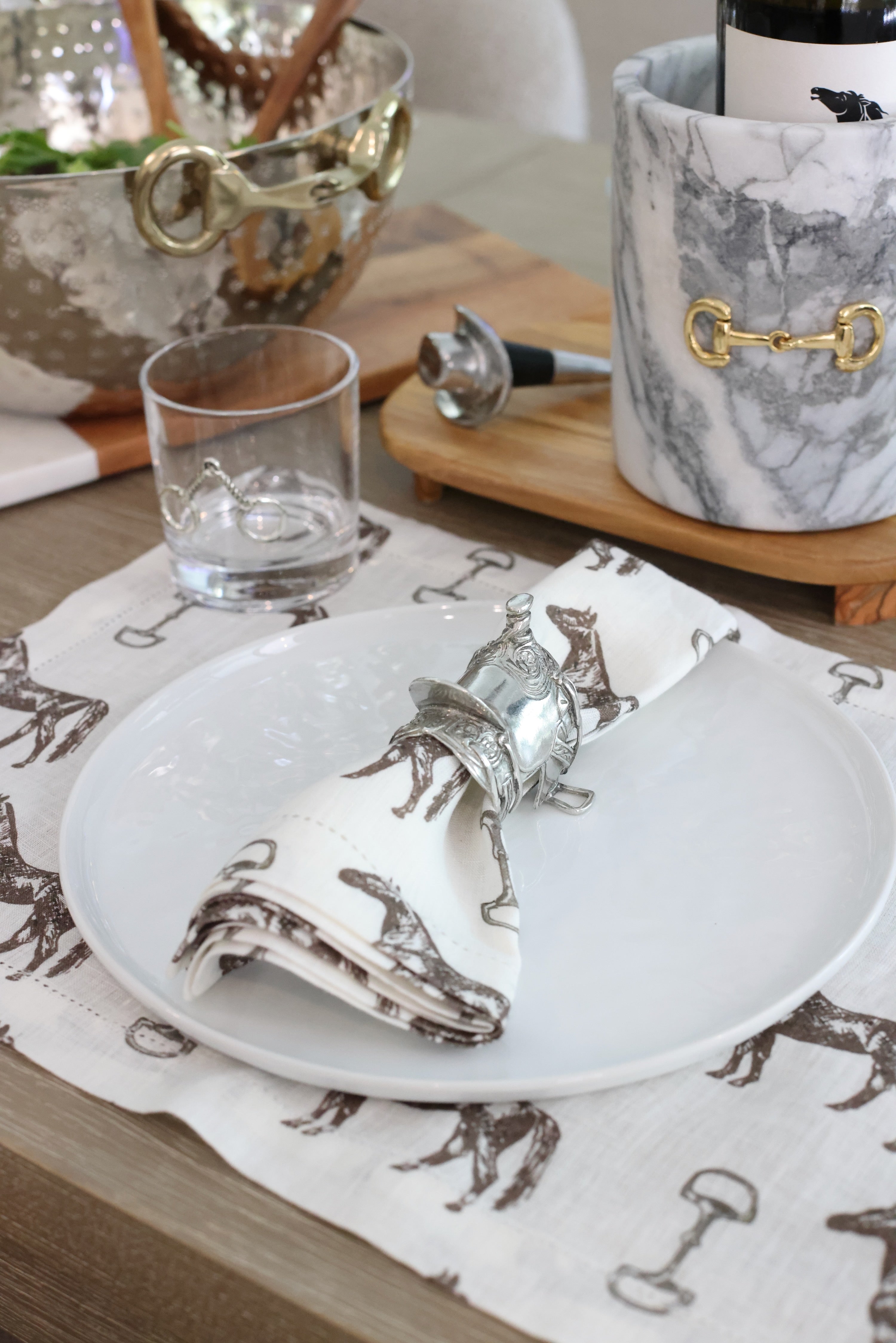 pomegranate inc stylish equestrian horse and snaffle linen placemat set Horse & Snaffle Linen Placemat Set featuring a hand-sketched design of horses and snaffle bits on white linen with a stitched border. Set of four elegant 13x19" placemats perfect for equestrian-inspired table settings.