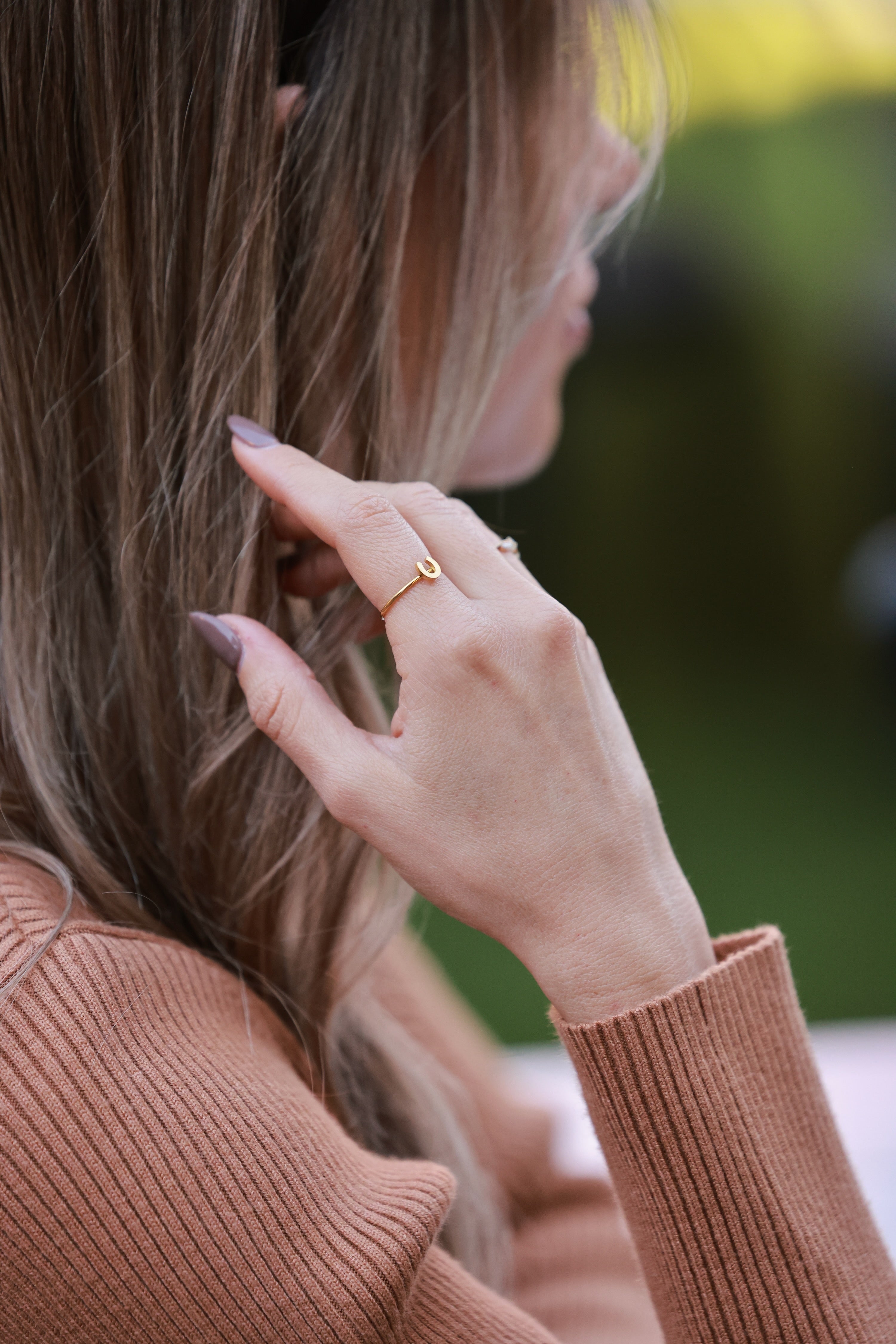Gold Horseshoe Stacking Ring in 18K gold-plated, water- and tarnish-resistant, hypoallergenic design. Dainty minimalist equestrian ring featuring a classic horseshoe symbol — perfect for stacking or gifting to horse lovers.
