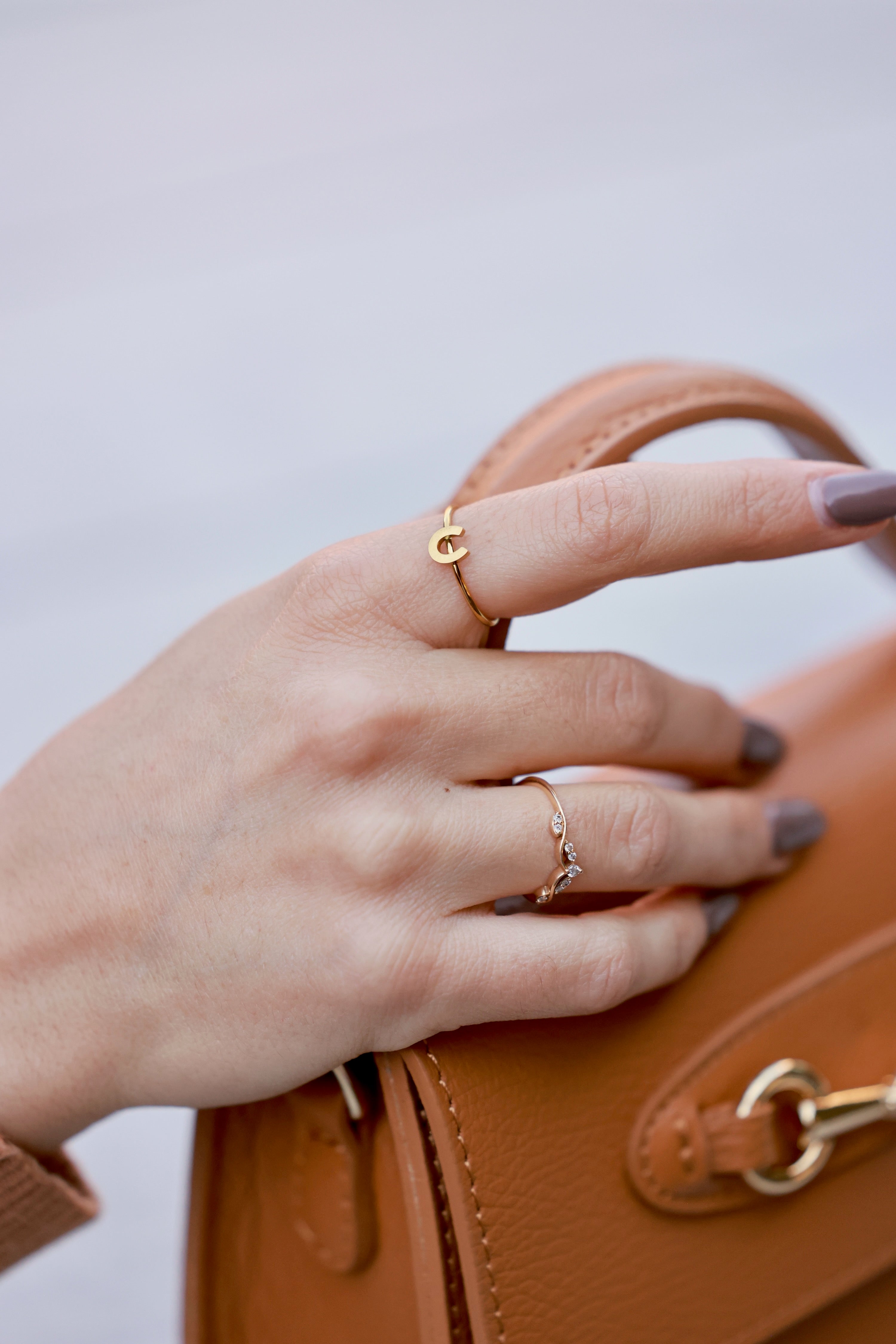 Gold Horseshoe Stacking Ring in 18K gold-plated, water- and tarnish-resistant, hypoallergenic design. Dainty minimalist equestrian ring featuring a classic horseshoe symbol — perfect for stacking or gifting to horse lovers.