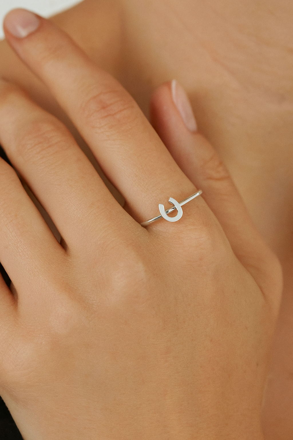 Silver ring with a unique design on a person's finger - equestrian accessory, horse themed jewelry, horseshoe ring, stacking ring, minimal equestrian ring, gifts for horse lovers