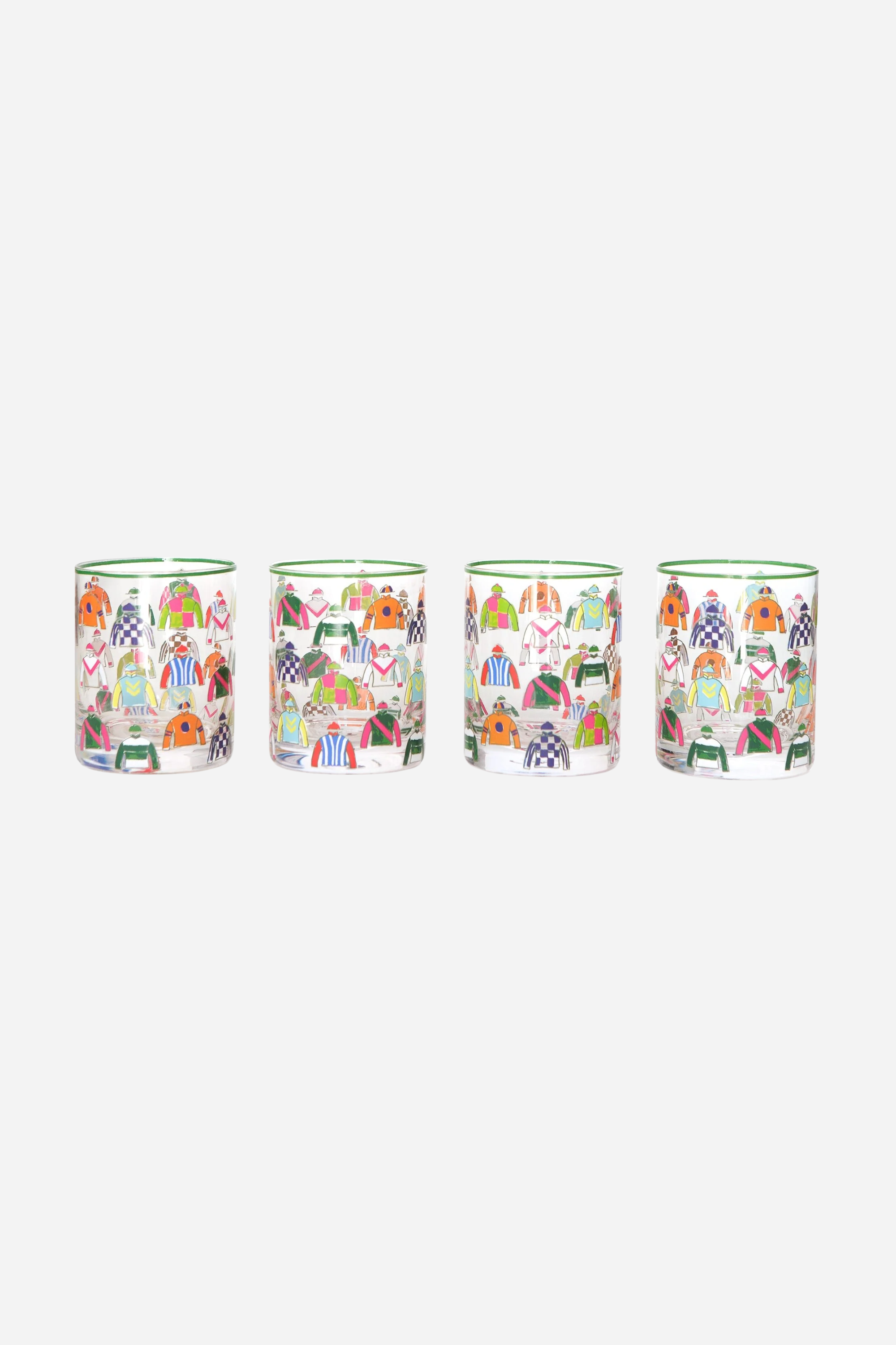 Pomegranate Jockey Silks Short Drinking Glass Set Get ready for the races with the Jockey Silks Bourbon Glass set. Each glass in this set of four is wrapped in a vibrant parade of racing silks, reminiscent of Derby Day at Churchill Downs or a crisp autumn afternoon at Keeneland. Whether you’ve got a colt in the running or you’re just here for the juleps, these glasses are a sure bet for any gathering.