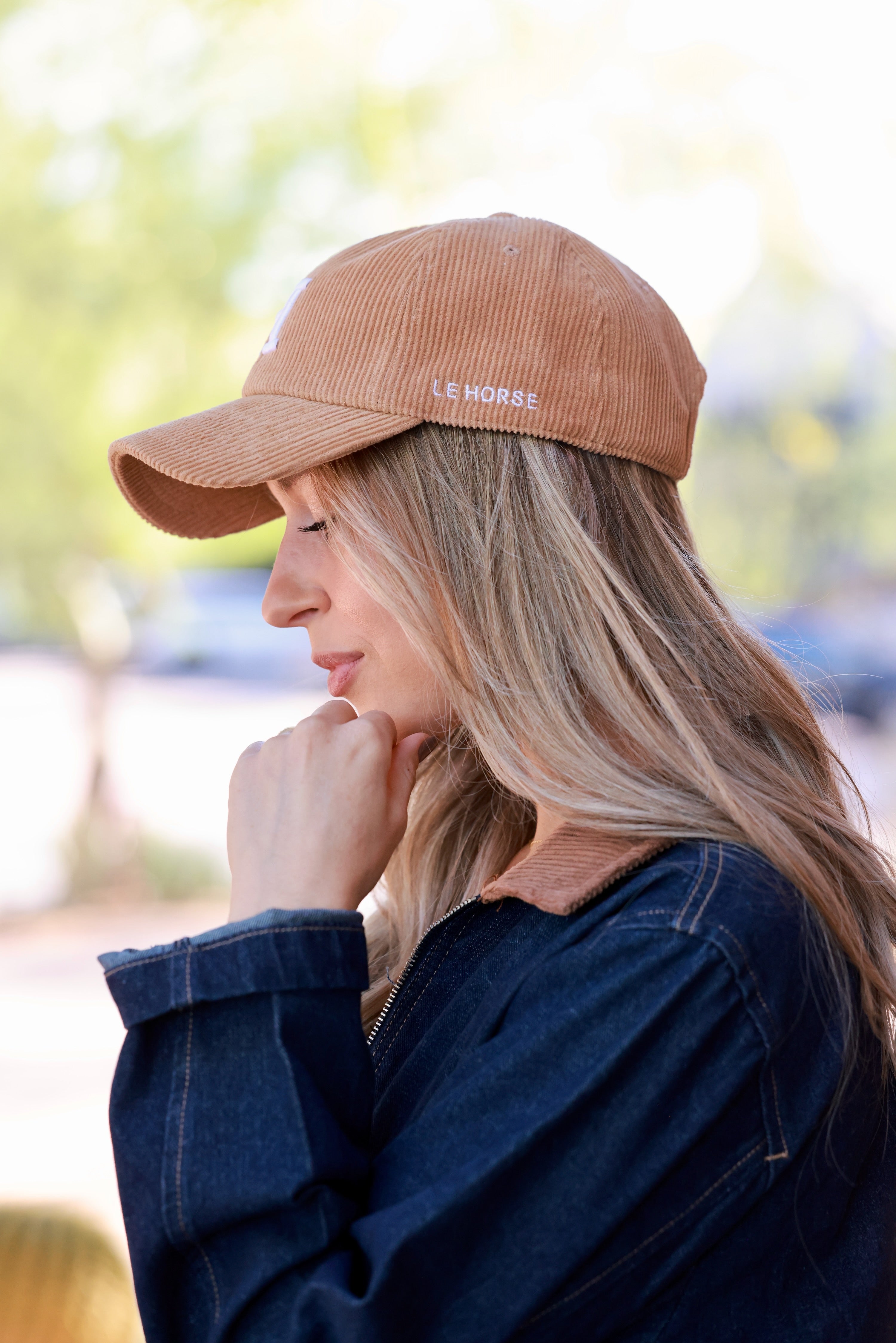 Camel Le Horse Corduroy Cap featuring trendy embroidered ‘H’ front and side Le Horse detail. Unstructured, low-profile six-panel design with pre-curved visor and adjustable strap for a comfortable fit.