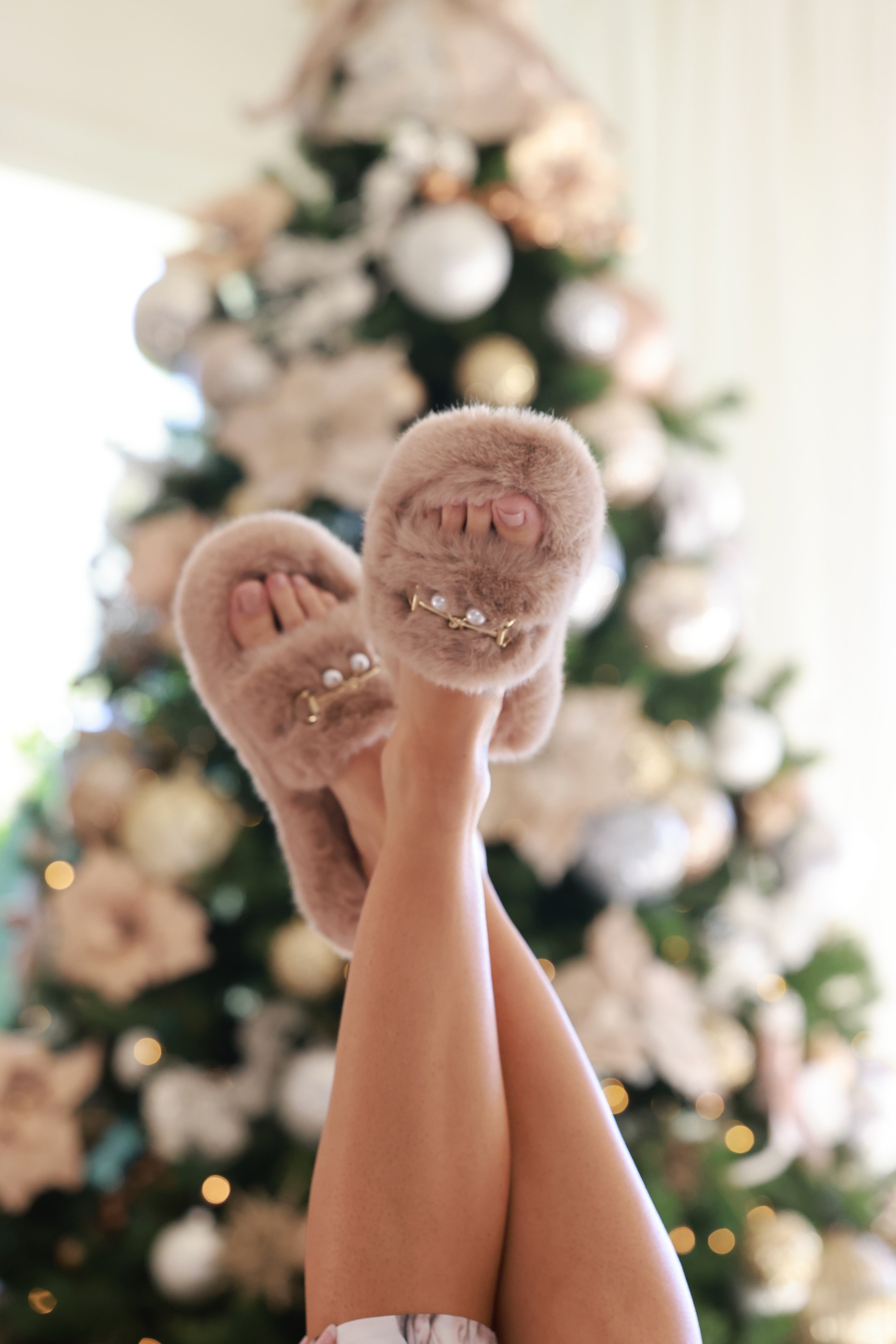 London Bit Slide – Taupe by Stylish Equestrian, a luxurious faux fur slipper featuring a gold snaffle bit and pearl detail for an elevated equestrian touch. Designed with a cozy semi-platform, hard non-slip sole, and plush interior for chic comfort indoors or out. Perfect blend of refinement and relaxation for horse lovers and fashion-forward women. equestrian slippers, faux fur bit slippers, women’s equestrian fashion, stylish cozy footwear, horse bit detail slippers, chic indoor outdoor slides