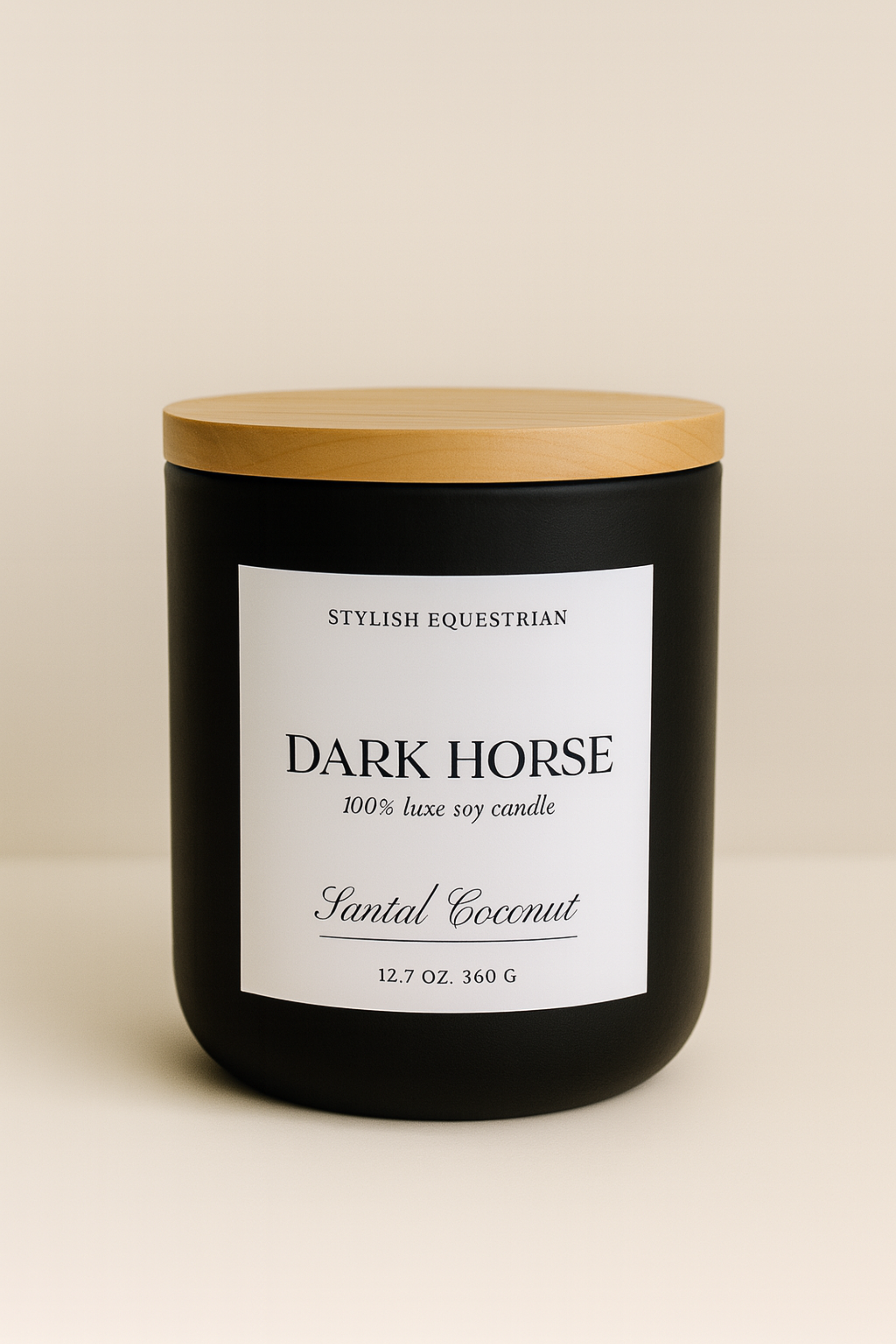 Luxe Signature Candle – Dark Horse edition, a handmade 100% soy wax candle in a frosted matte glass jar with wooden lid. Features a warm santal coconut scent with notes of amber, cedarwood, and vanilla. Elegant equestrian-inspired home accent with 60+ hour burn time. Made in the USA. equestrian decor and home accents, horse themed candle, gifts for horse lovers, luxury soy candle, santal coconut candle, Dark Horse candle, equestrian home fragrance, wooden lid candle, elegant horse gift