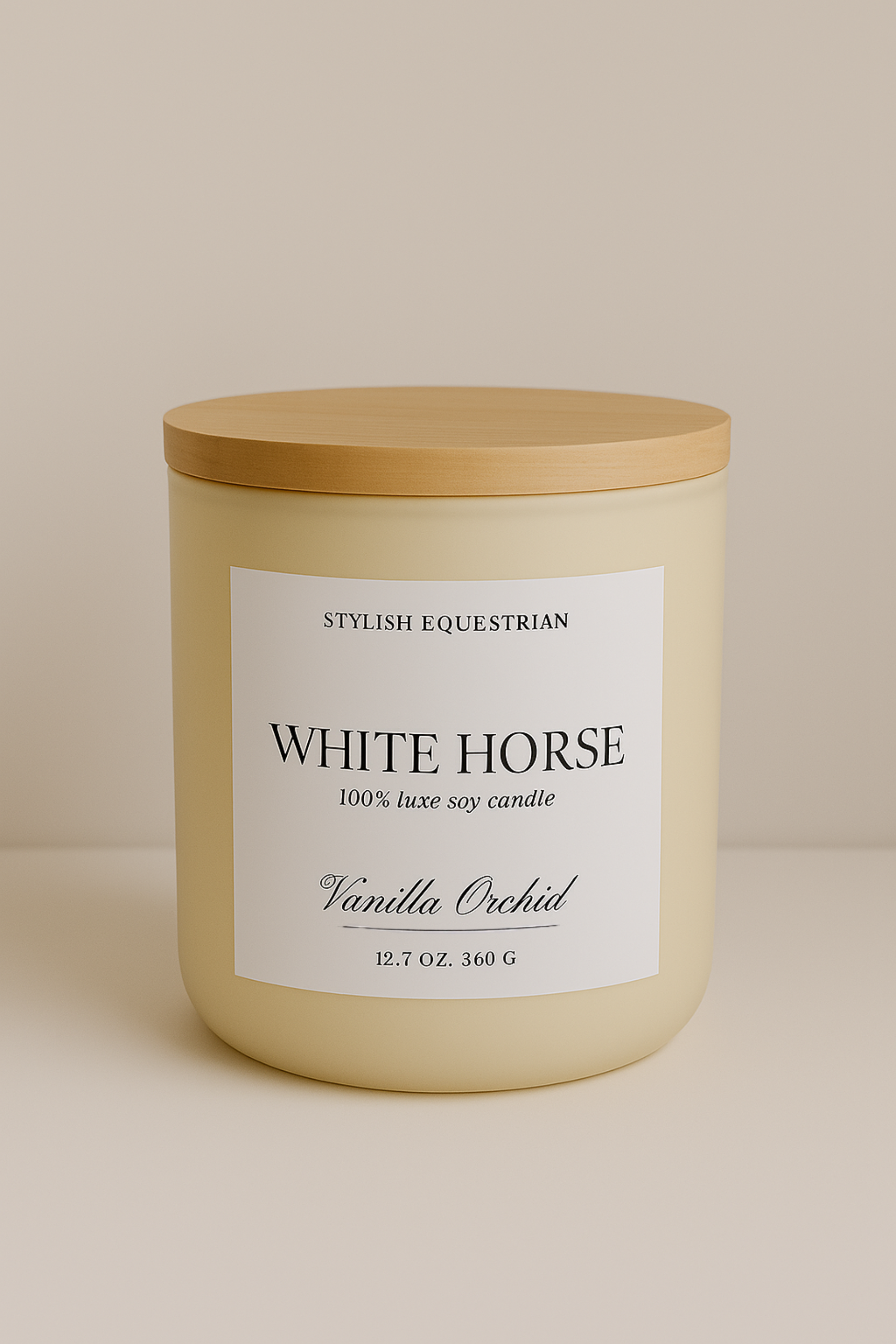 Luxe Signature Candle – White Horse edition, a handmade 100% soy wax candle in a frosted matte glass jar with wooden lid. Features a soothing Vanilla Orchid scent with notes of orange, green leaves, jasmine, sandalwood, and creamy vanilla. Elegant equestrian-inspired home accent with a 60+ hour burn time. Made in the USA. equestrian decor and home accents, horse themed candle, gifts for horse lovers, luxury soy candle, vanilla orchid candle, White Horse candle, equestrian home fragrance