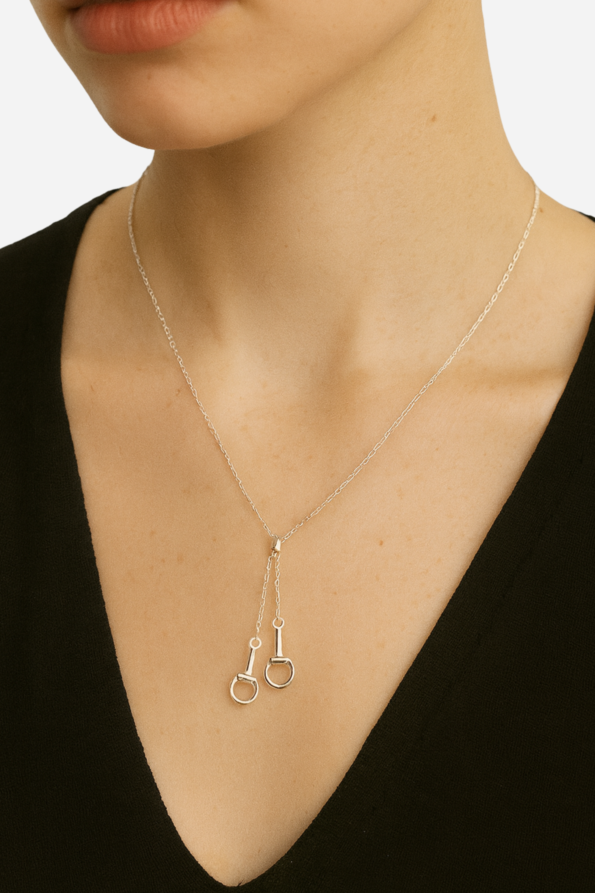 Silver equestrian necklace with adjustable sliding bead and horse bit pendants, dainty horse girl jewelry, minimalist horseshoe necklace, elegant gift for horse lovers.