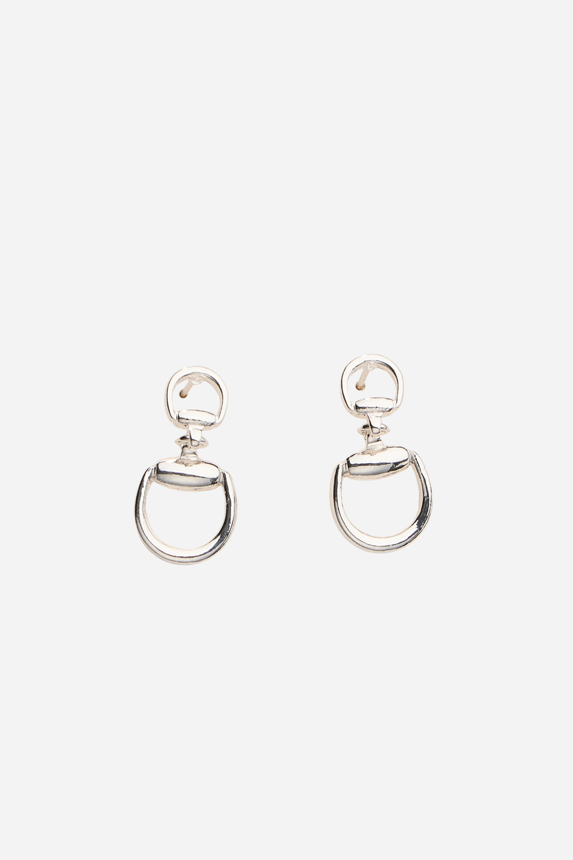 Silver equestrian drop earrings with interlocking D-ring design, minimalist horse bit jewelry, lightweight statement earrings for women, elegant gift for horse lovers.