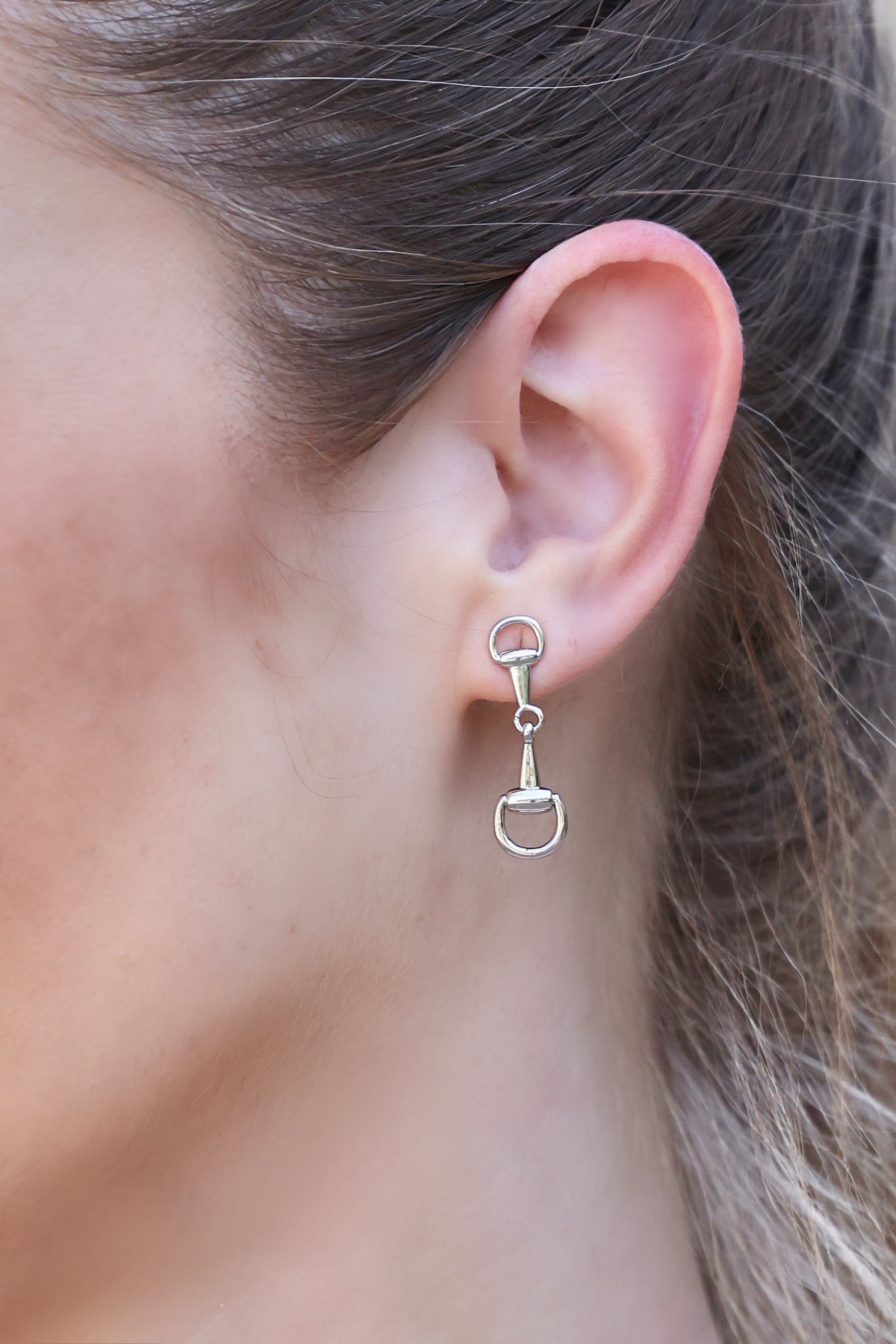 Luv AJ Madison Earrings - Silver Pair of chic understated horsebit studs