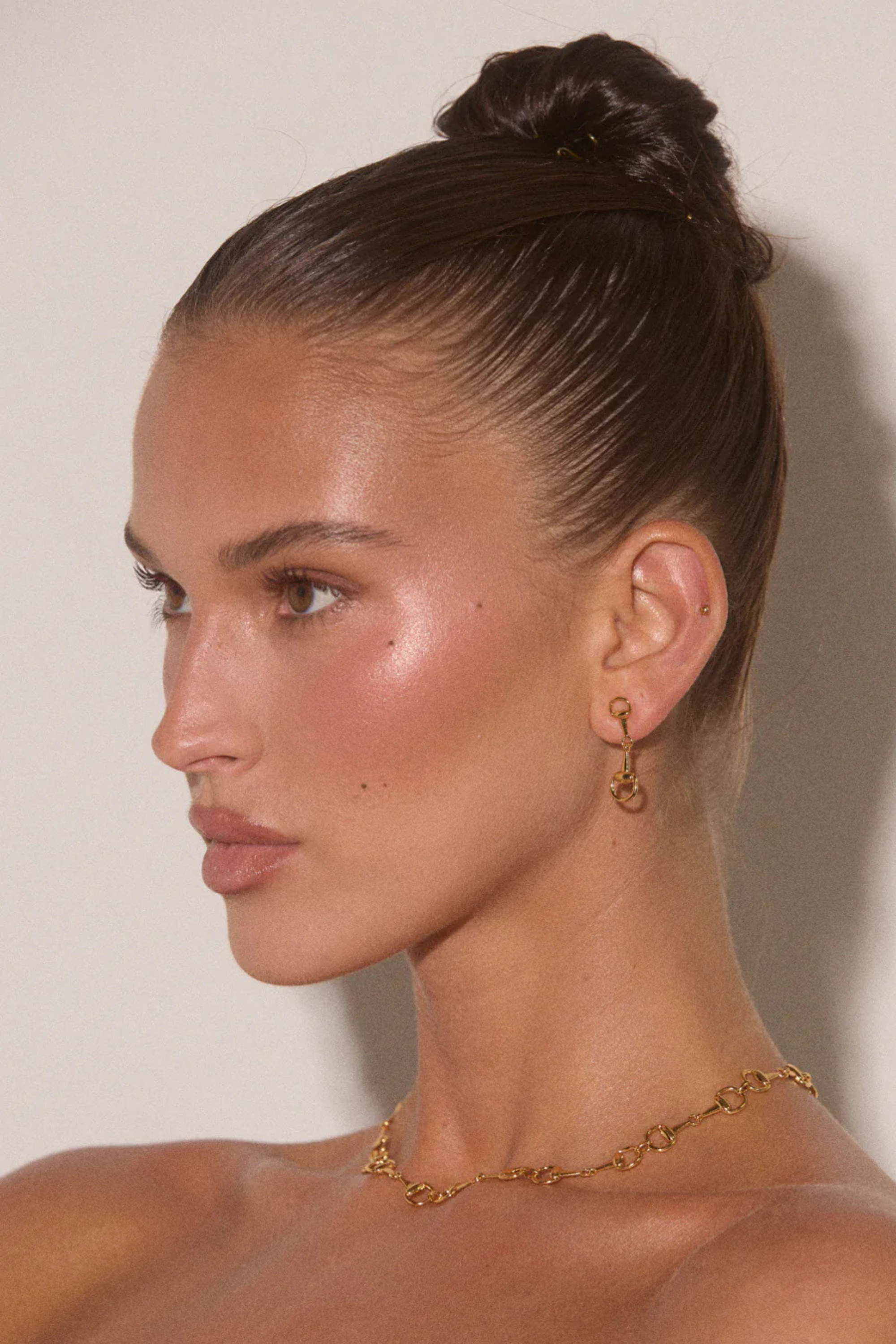 Luv AJ Madison Earrings - Gold Pair of chic understated horsebit studs