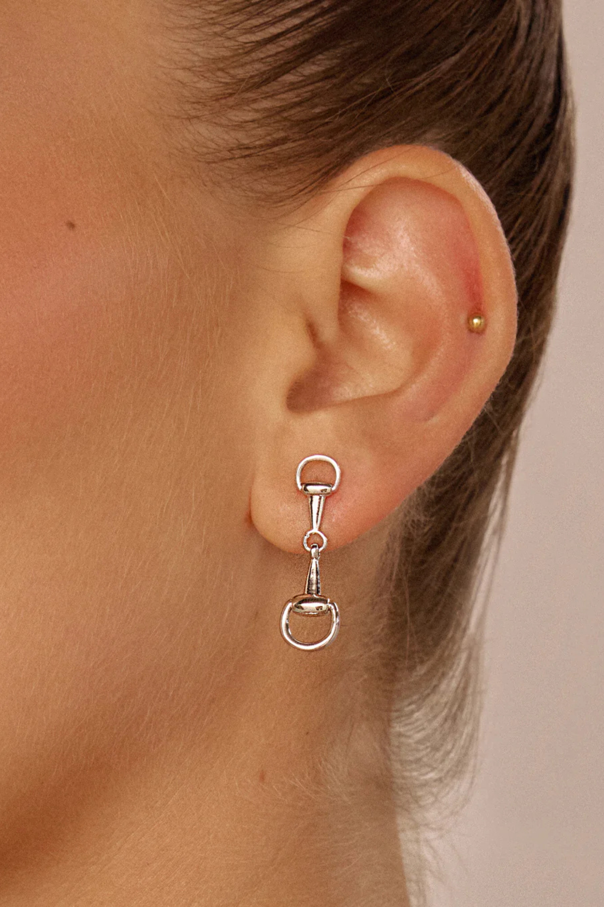 Luv AJ Madison Earrings - Silver Pair of chic understated horsebit studs