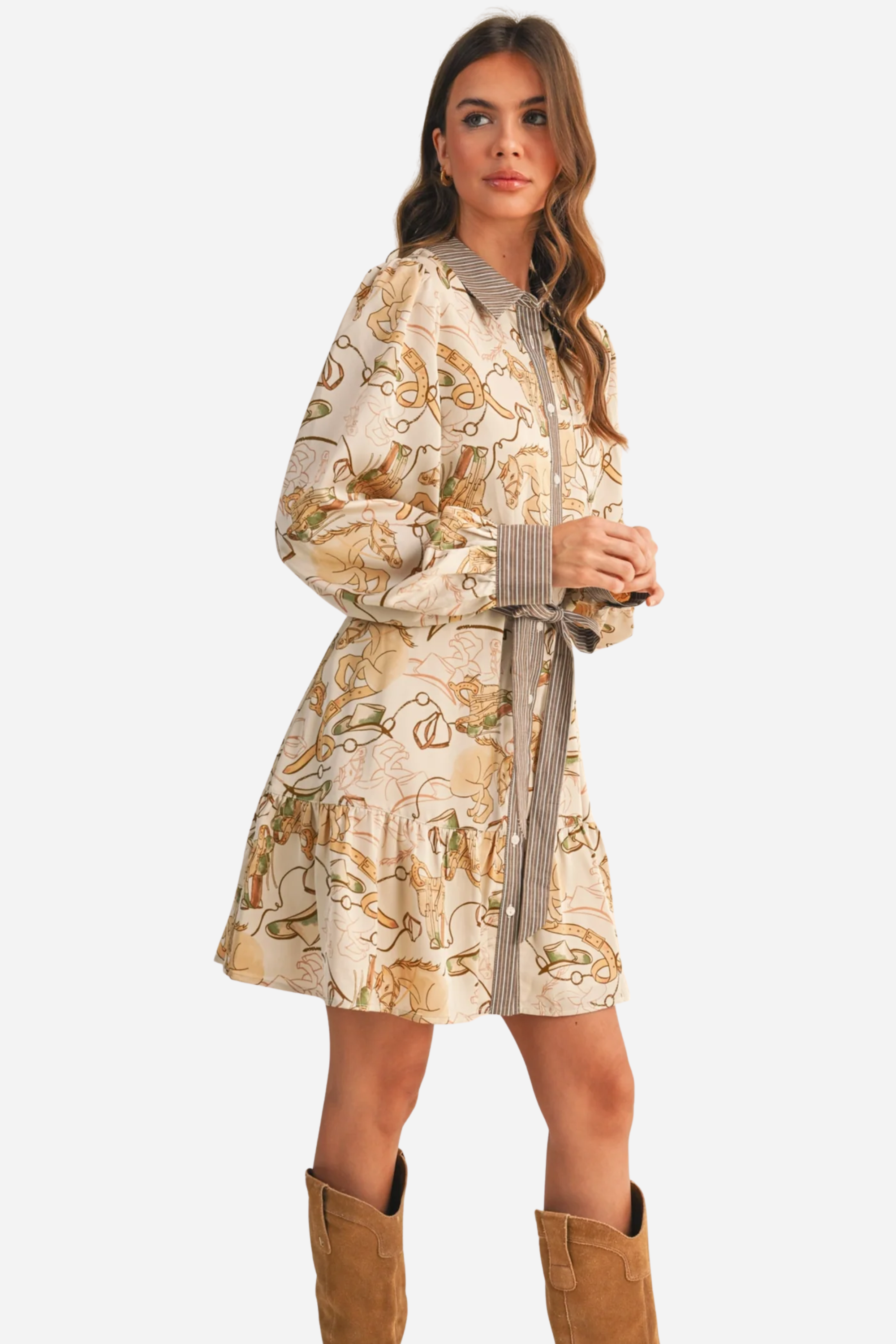 Woman wearing a patterned dress with a belt against a beige background - print mini dress, &merci exclusive, Cowgirl print dress, Equestrian-inspired dress, Fall rodeo outfit
