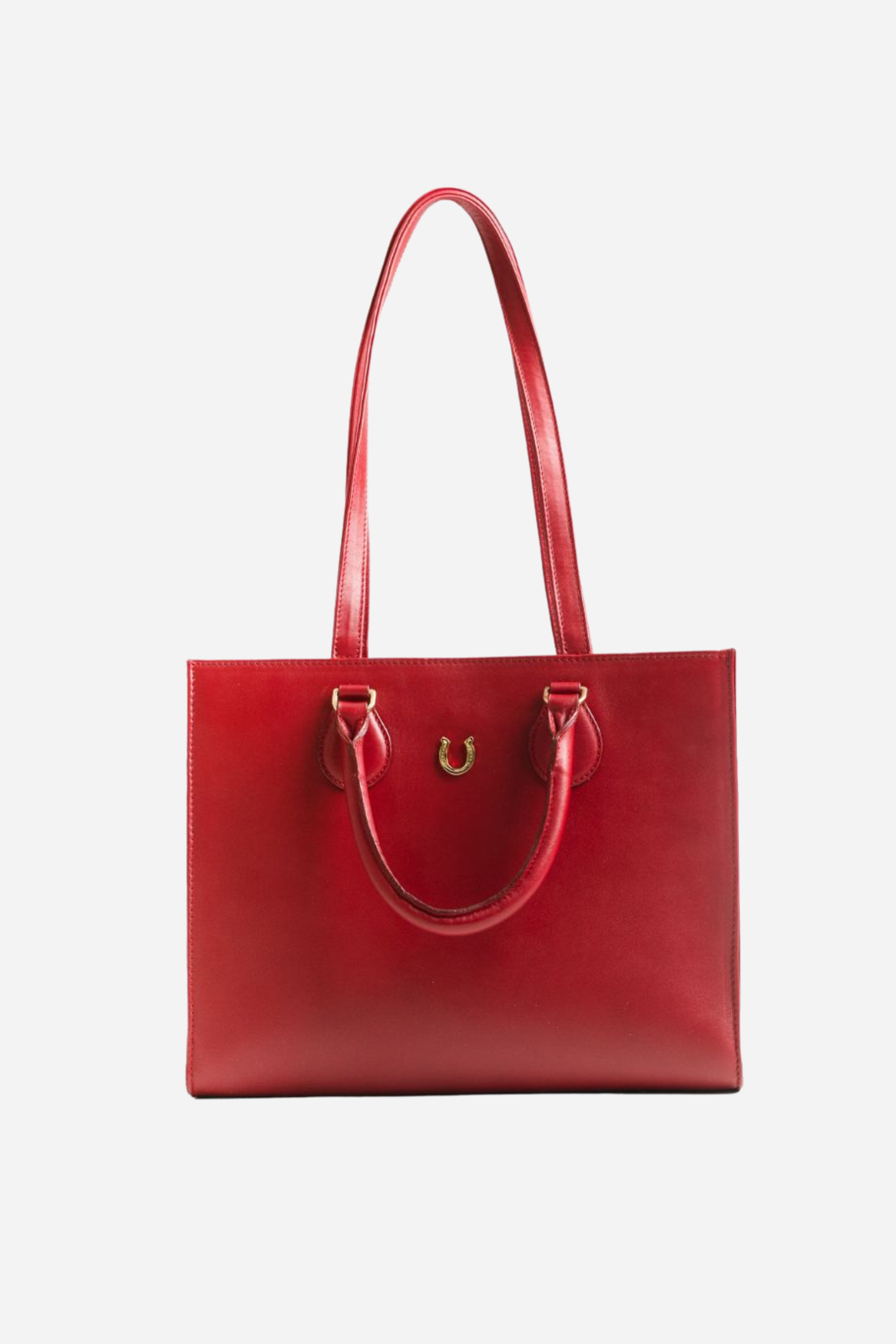 Spacious equestrian leather tote bag with a classic silhouette, gold hardware, interior compartments, and convertible top-handle or shoulder straps.