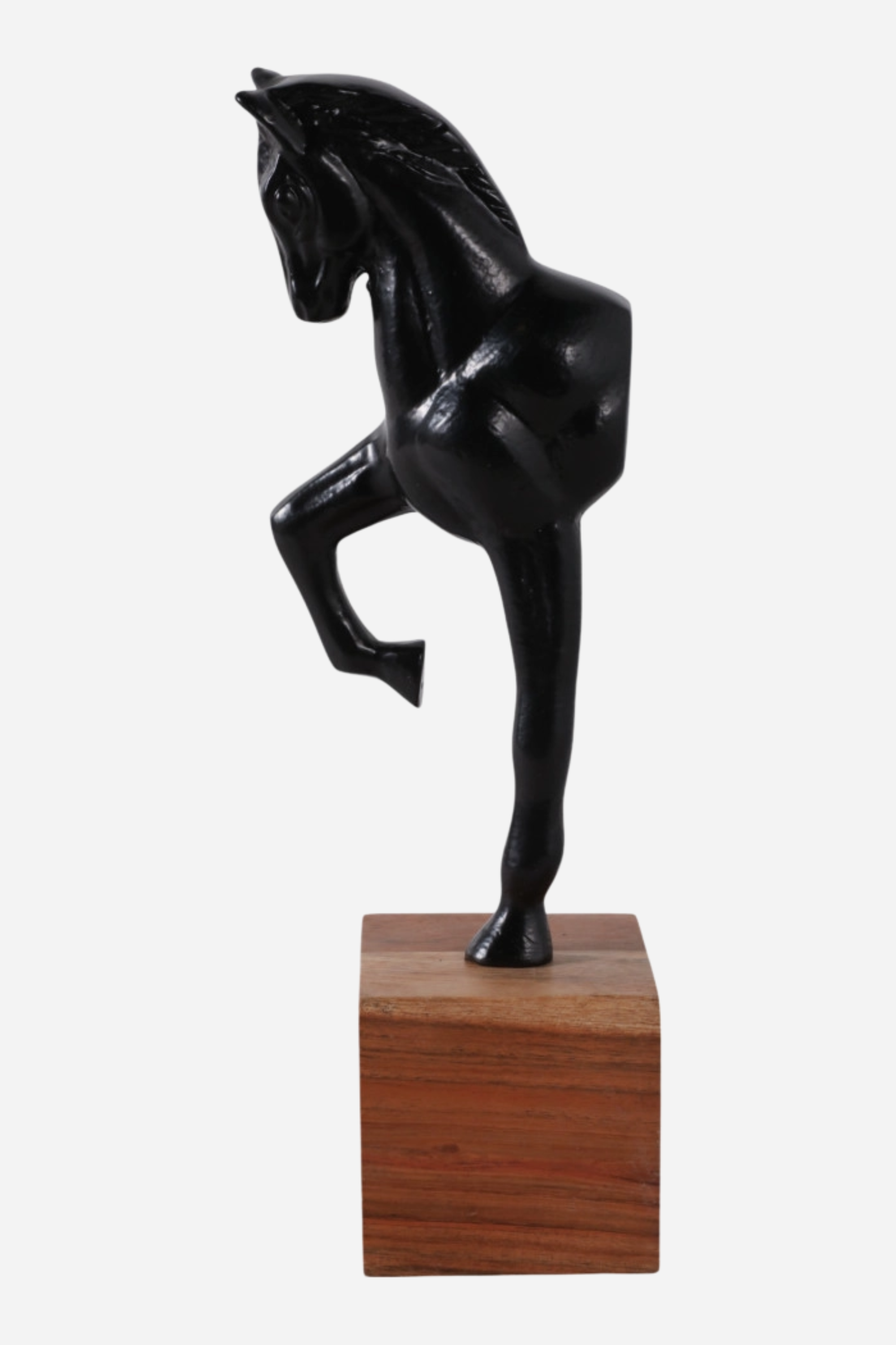 Equestrian home decor featuring metal horse sculpture on wood base, handcrafted design. horse decor, equestrian home decor, horse sculpture, horse figurine, equestrian accent piece, horse themed decor