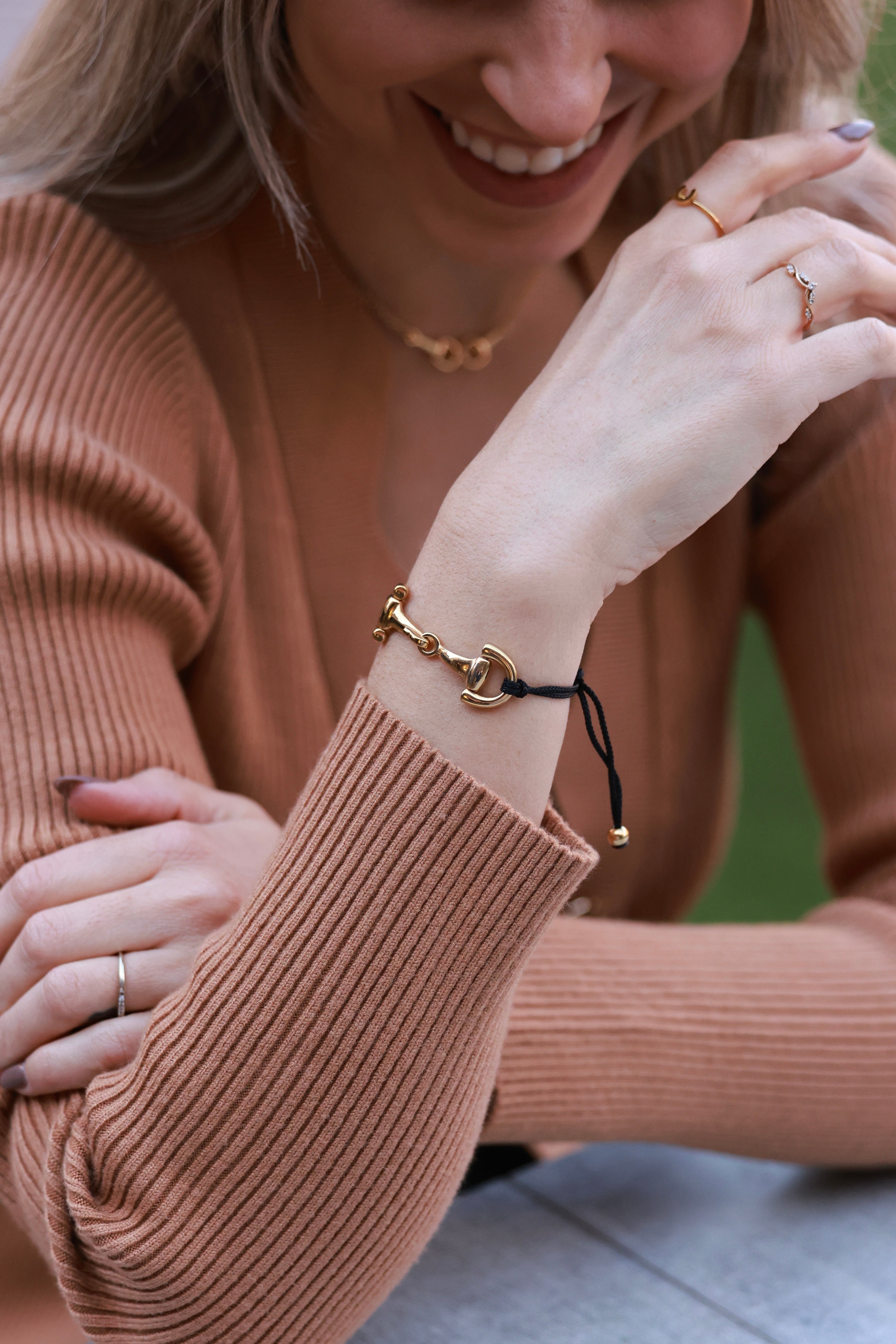Black Pony Bracelet from Stylish Equestrian x Dimacci, handmade in Germany with an adjustable nylon band and polished stainless steel snaffle bit accent. A dainty equestrian-inspired bracelet perfect for layering or gifting to horse lovers.