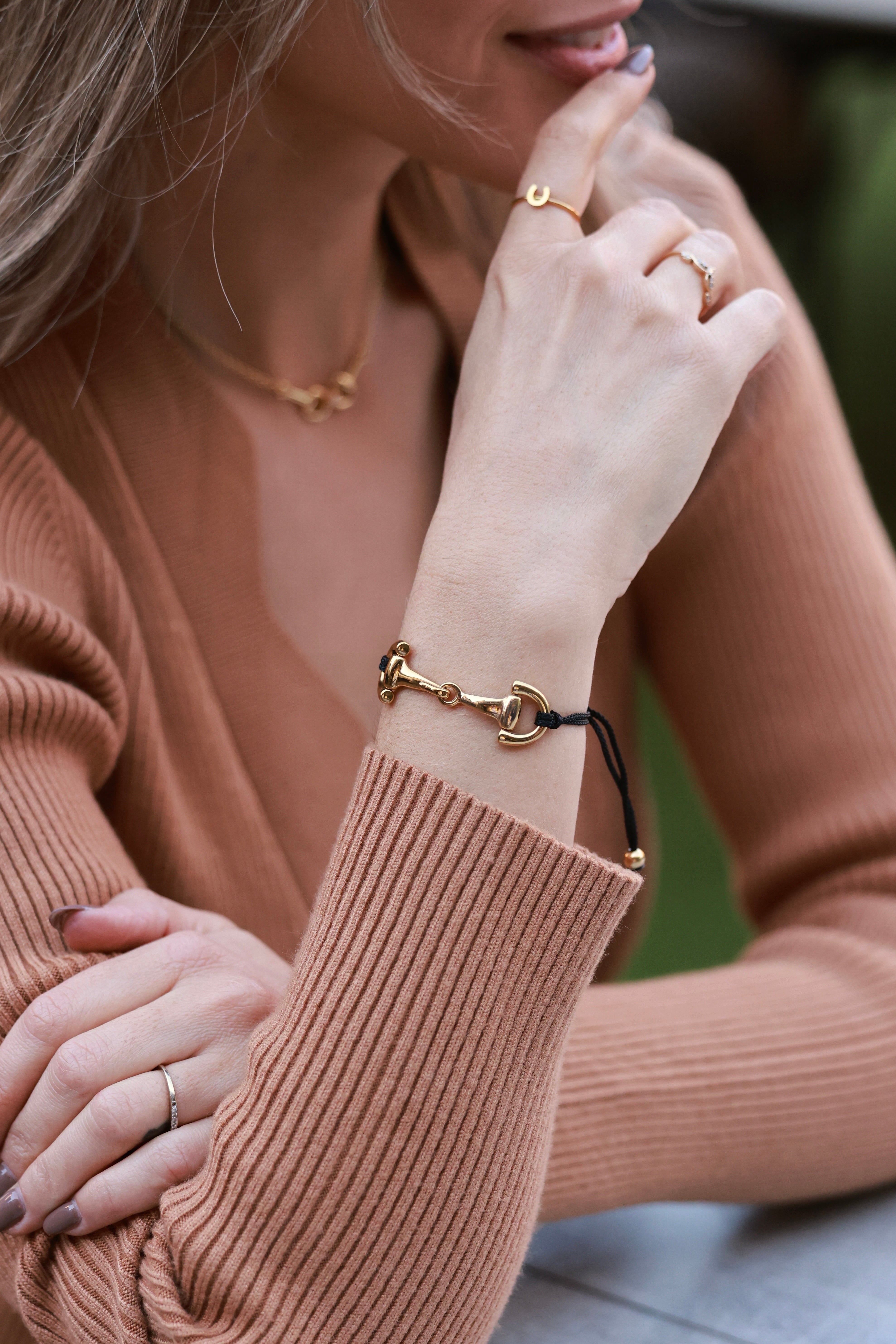 Black Pony Bracelet from Stylish Equestrian x Dimacci, handmade in Germany with an adjustable nylon band and polished stainless steel snaffle bit accent. A dainty equestrian-inspired bracelet perfect for layering or gifting to horse lovers.