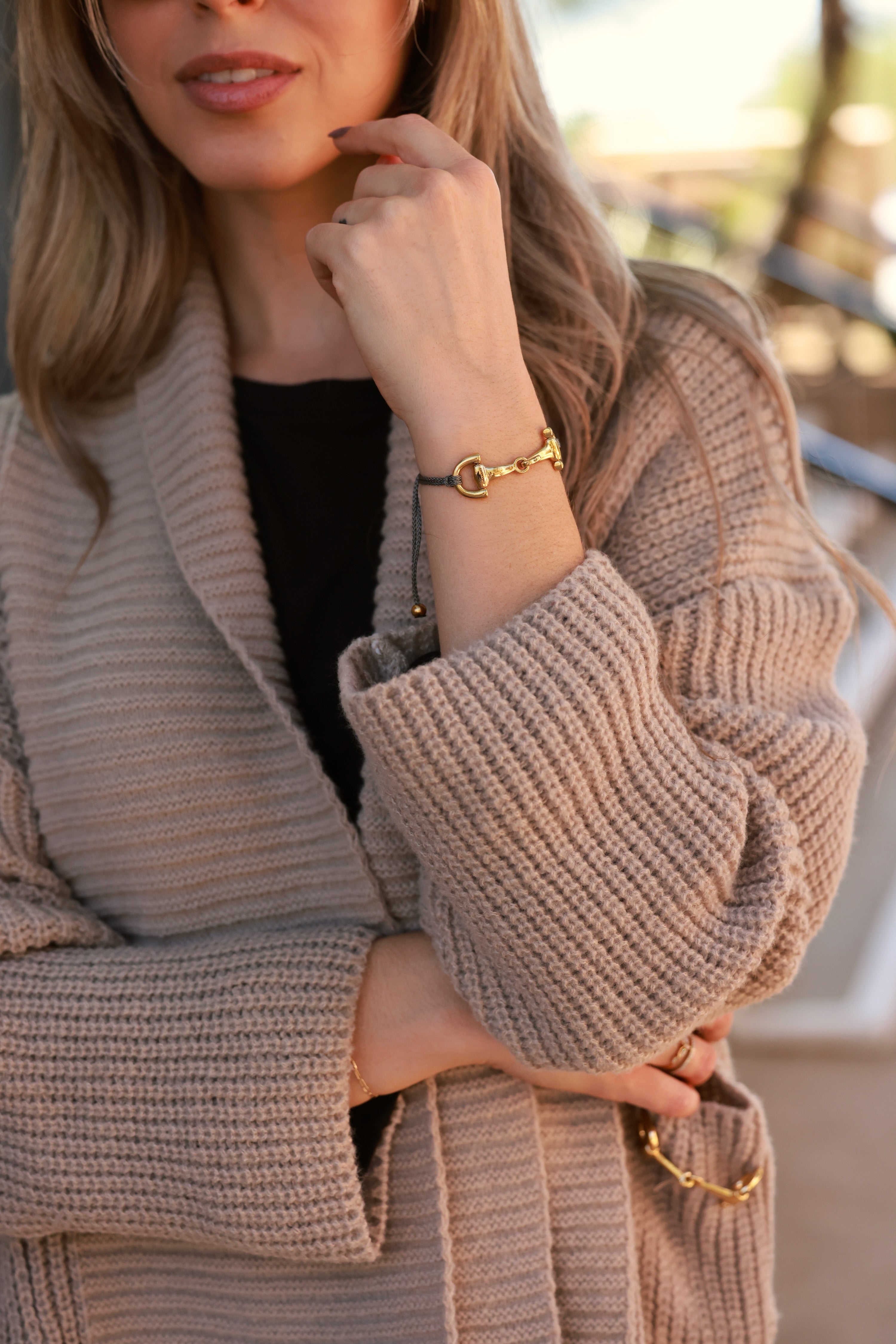 Grey Pony Bracelet from Stylish Equestrian x Dimacci, handmade in Germany with an adjustable nylon band and polished stainless steel snaffle bit detail. Elegant, dainty equestrian bracelet perfect for layering or gifting to horse lovers.