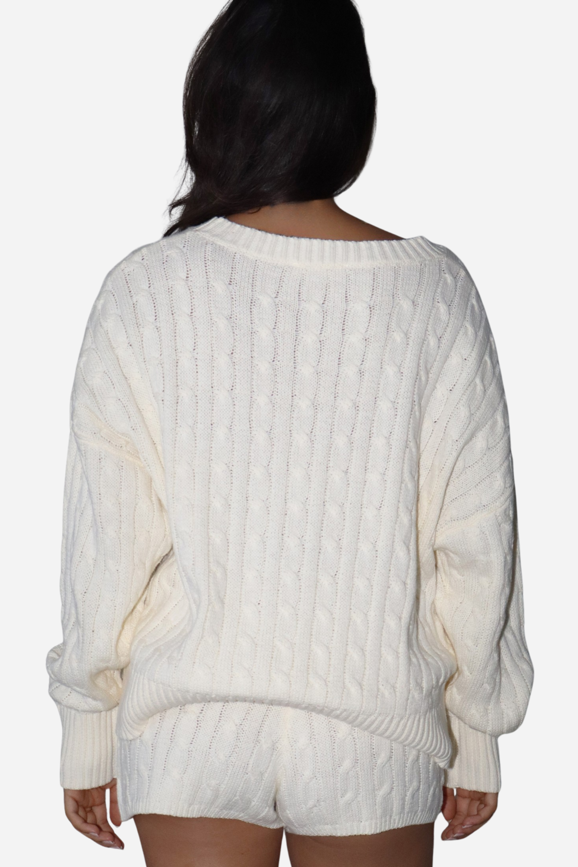 The Girls Rodeo Club Sweater blends classic varsity style with timeless equestrian charm. Designed with a relaxed dropped-shoulder silhouette and finished with textured cable-knit detailing, this cozy knit delivers effortless western sophistication, whether you're at the barn, in town, or layered for cool spring rides. Featuring navy embroidered varsity lettering across a soft cream knit, this sweater captures the spirit of rodeo heritage with a modern cowgirl feel.