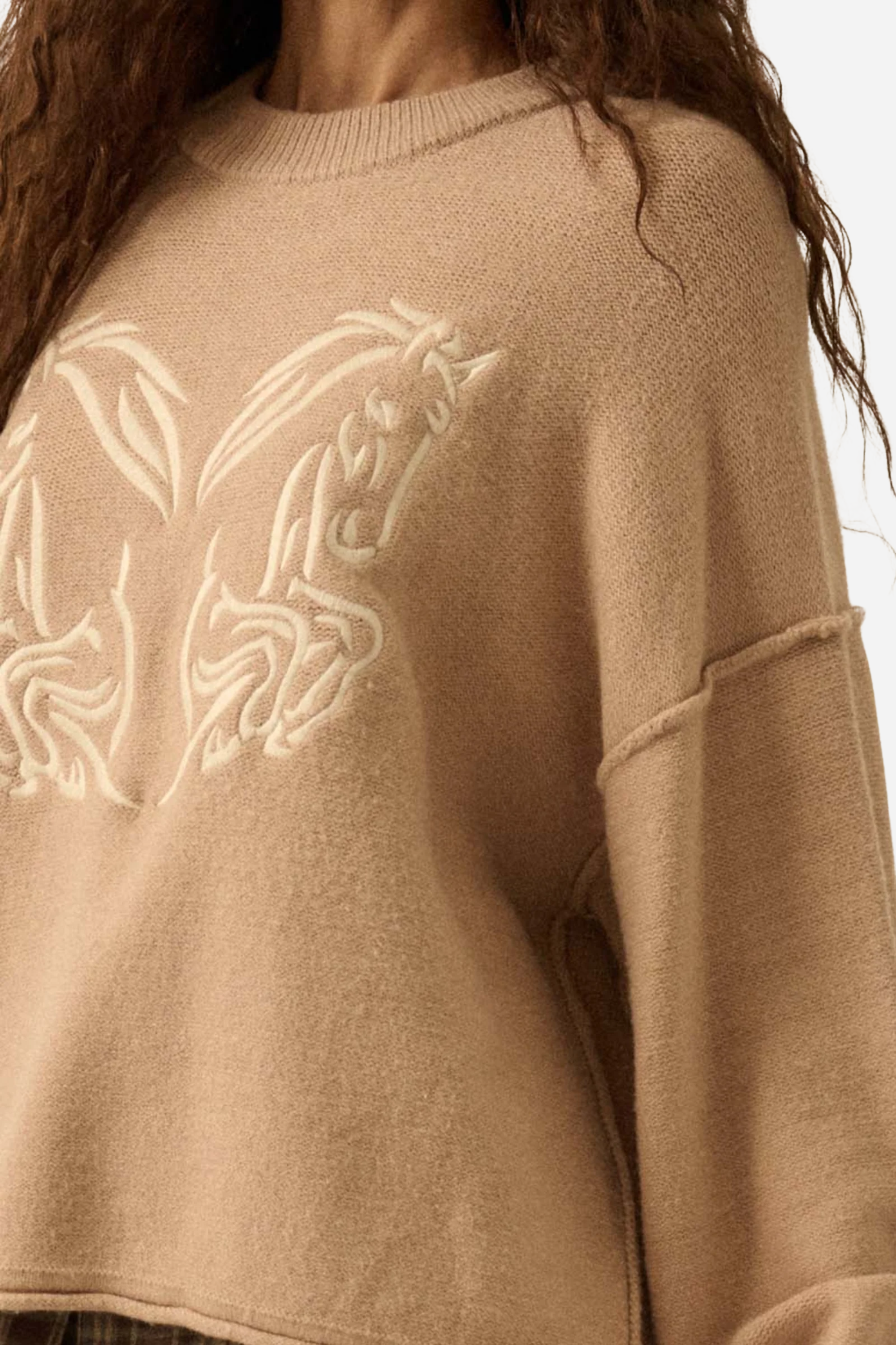 Style: solid knit sweater, Embroidered horses design on front, Crew neckline, Long sleeves with drop shoulder, Exposed seams, Side-split hem, Ribbed collar, cuffs, and hem, Loose fit, Aesthetic: classic retro/vintage, Fabric: 52% viscose, 29% polyester, 19% nylon, Fit: contemporary, Occasion: holiday and night out, Pattern: solid, Season: fall/winter