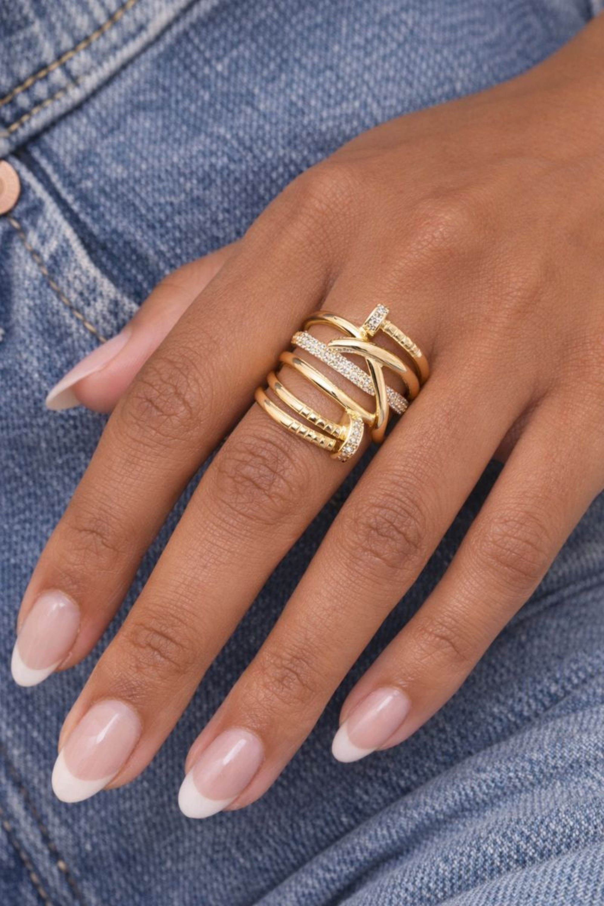 18k gold-plated nail-style ring with sparkling CZ accents, inspired by equestrian design and crafted over sterling silver.