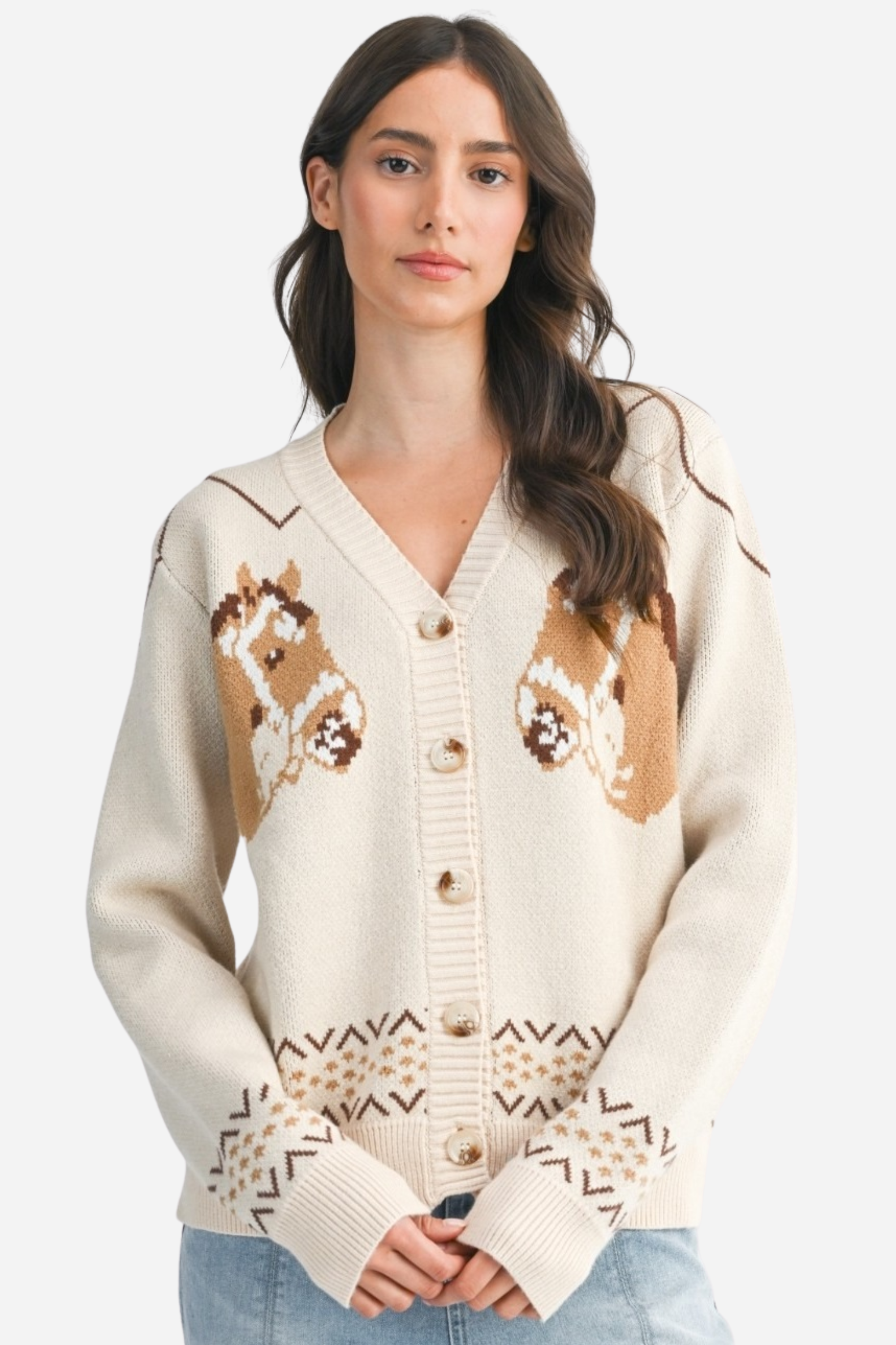 A cozy cream-colored knit cardigan with two brown horse graphics and subtle geometric fair isle trim. This long-sleeve, V-neck button-down features a relaxed, slightly cropped fit and soft viscose-poly blend fabric, offering a playful, equestrian-inspired look perfect for fall.