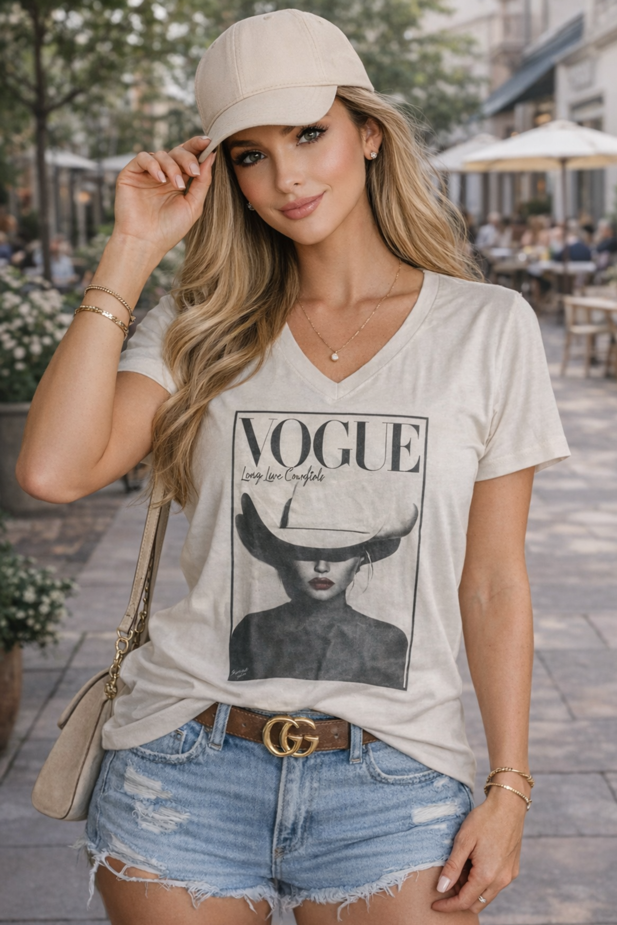 Vogue Cowgirl graphic tee with designer-inspired horse print, V-neck silhouette, made from 100% cotton.