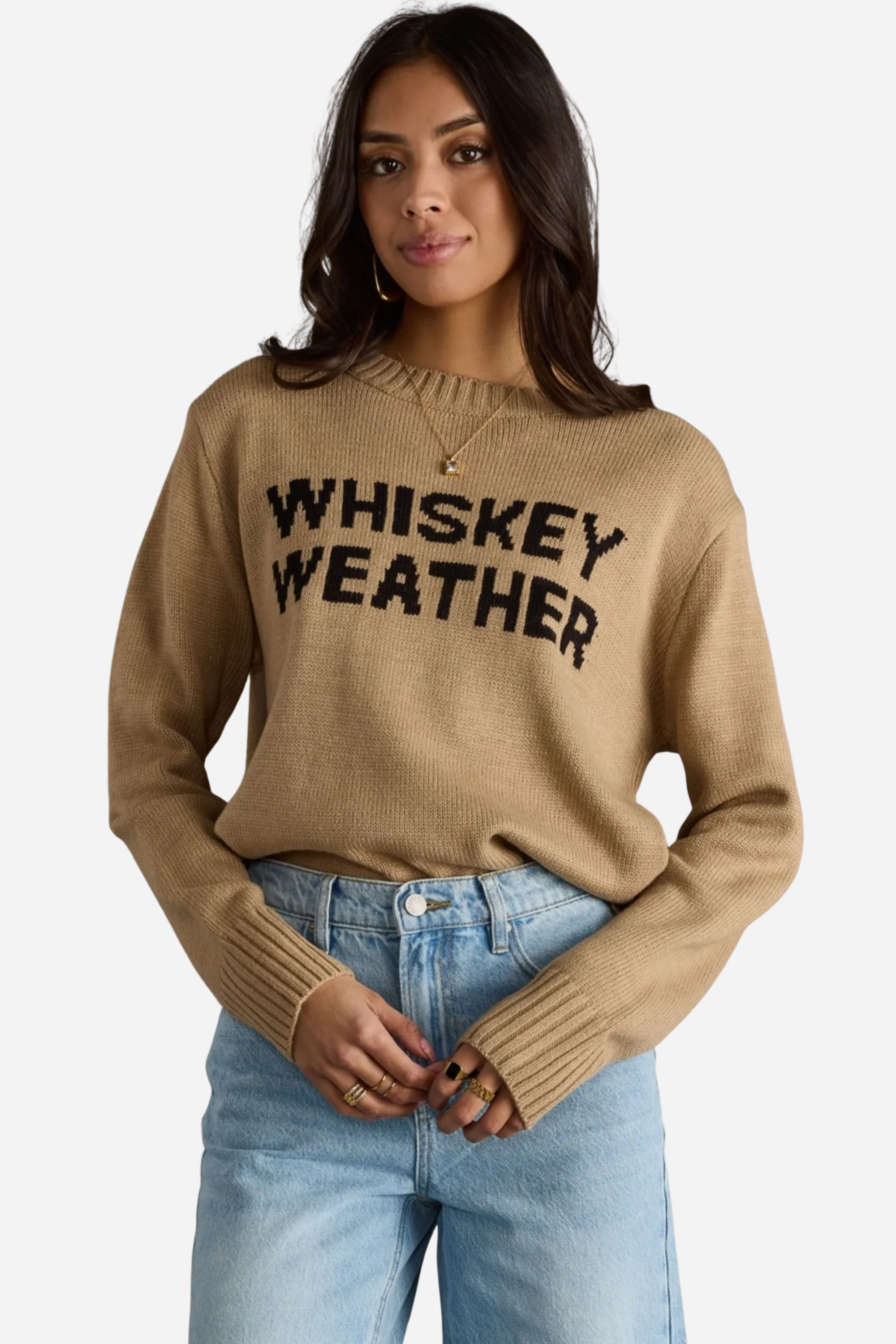 Woman wearing a beige sweater with 'WHISKEY WEATHER' text against a gray background - Whiskey weather sweater, Western graphic sweater, Fall country sweater, Taupe knit pullover, Cowgirl whiskey sweater