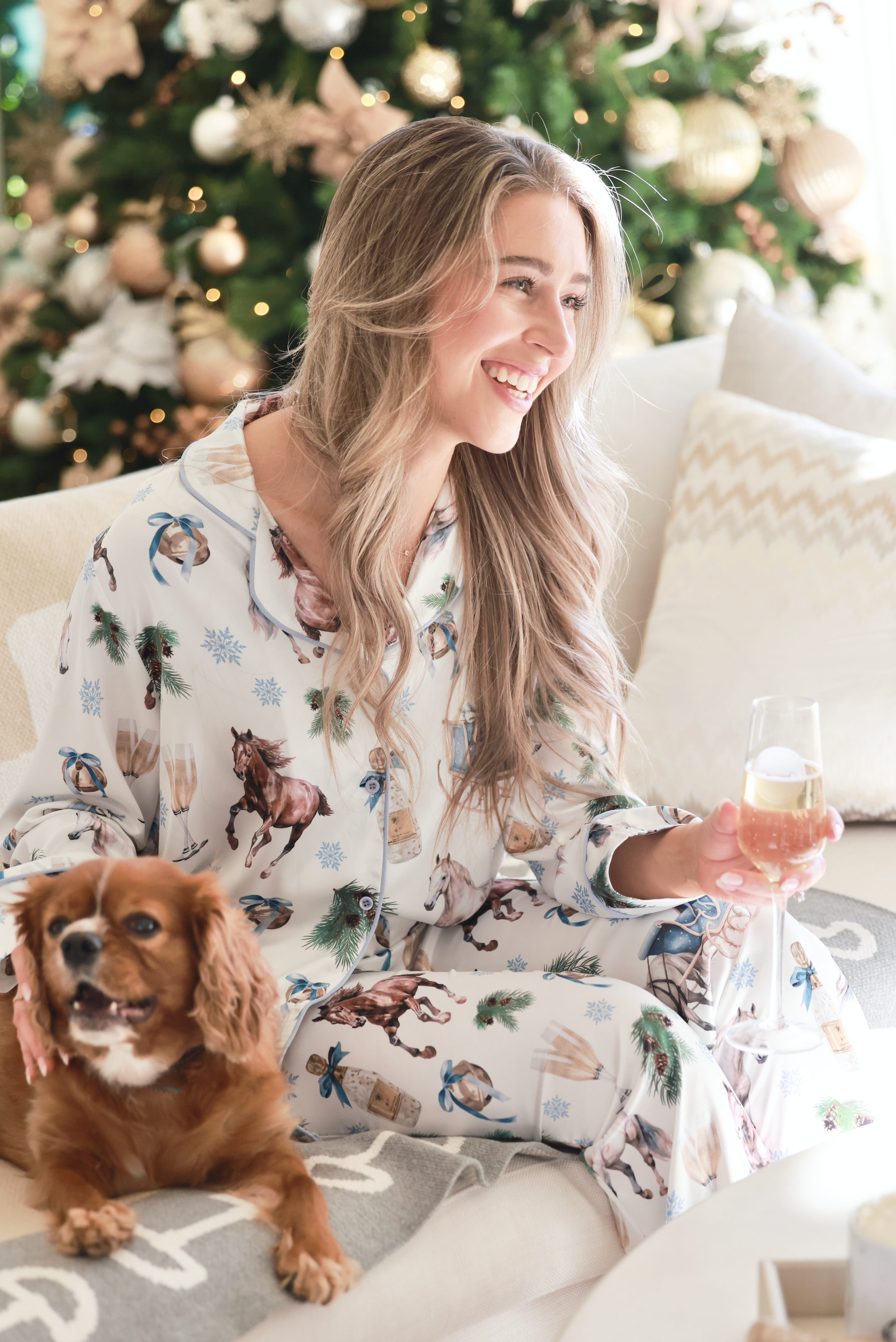 Festive equestrian satin pajama set with horse-themed holiday print, long-sleeve button-up top, and elastic-waist pants. A chic and cozy gift for horse lovers and equestrian girls.