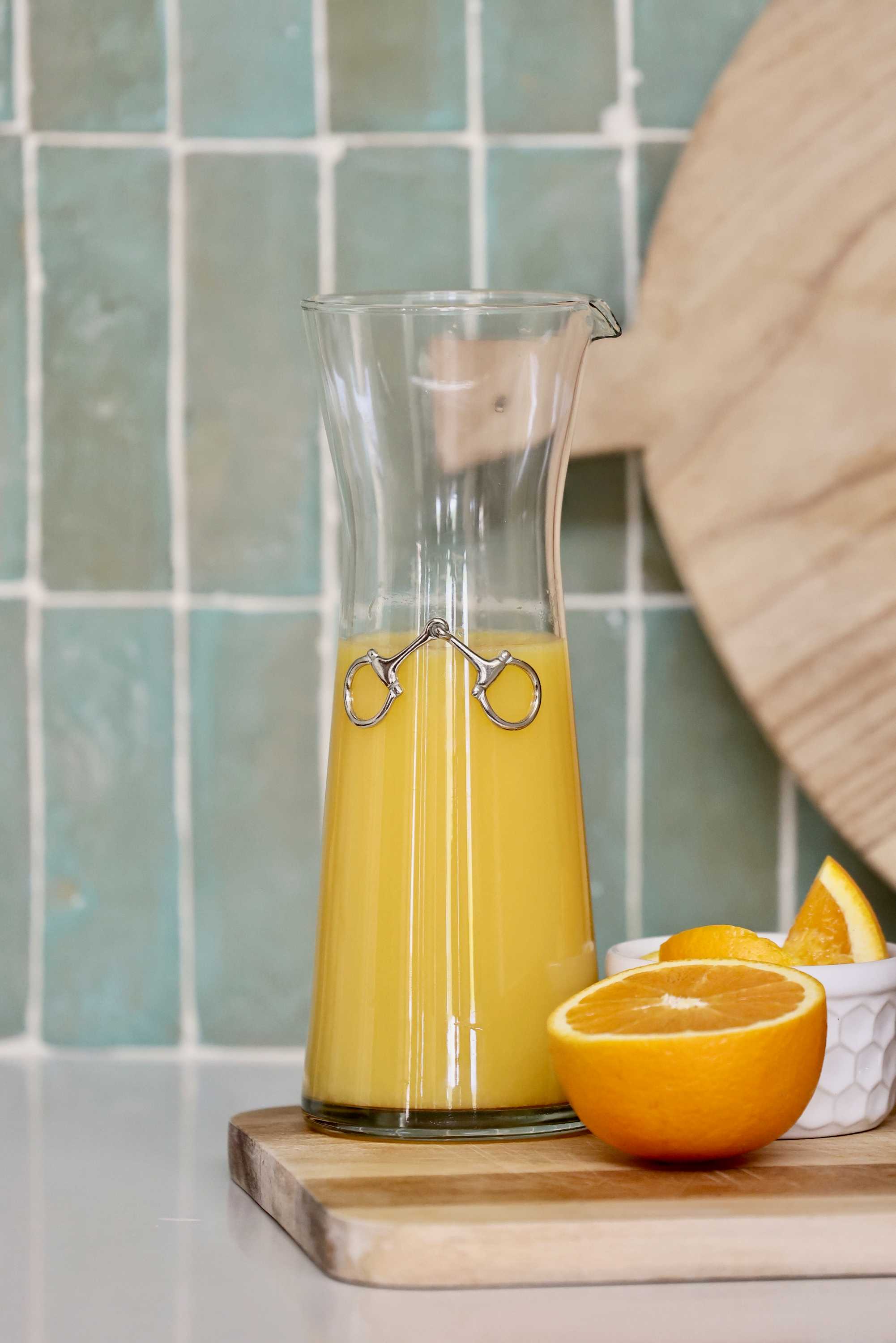 arthur court stylish equestrian dawson horse bit carafe Dawson Carafe by Arthur Court featuring a 28 oz clear glass body accented with a crafted pewter horse bit. A sophisticated equestrian-inspired carafe designed to enhance beverages and elevate any table setting.