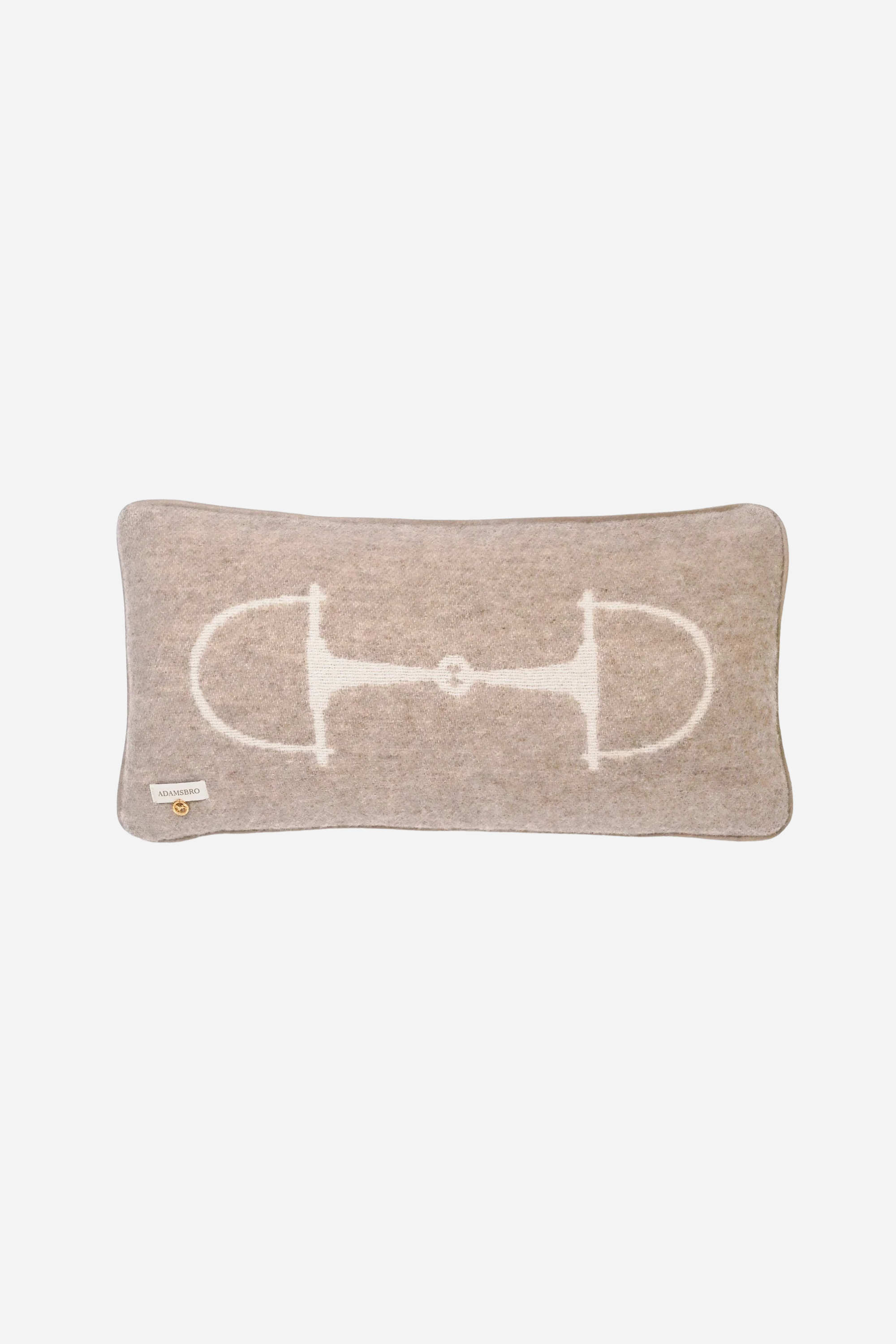 Equine Lumbar Wool Pillow - Vanilla Bean A Luxury rectangular cushion in vanilla bean, made from 100% New Zealand lambswool with ADAMSBRO’s signature equestrian bit pattern. Handcrafted in Sweden, featuring faux suede piping, concealed zipper, and a plush duck feather insert, a refined accent for timeless, Scandinavian-inspired interiors.