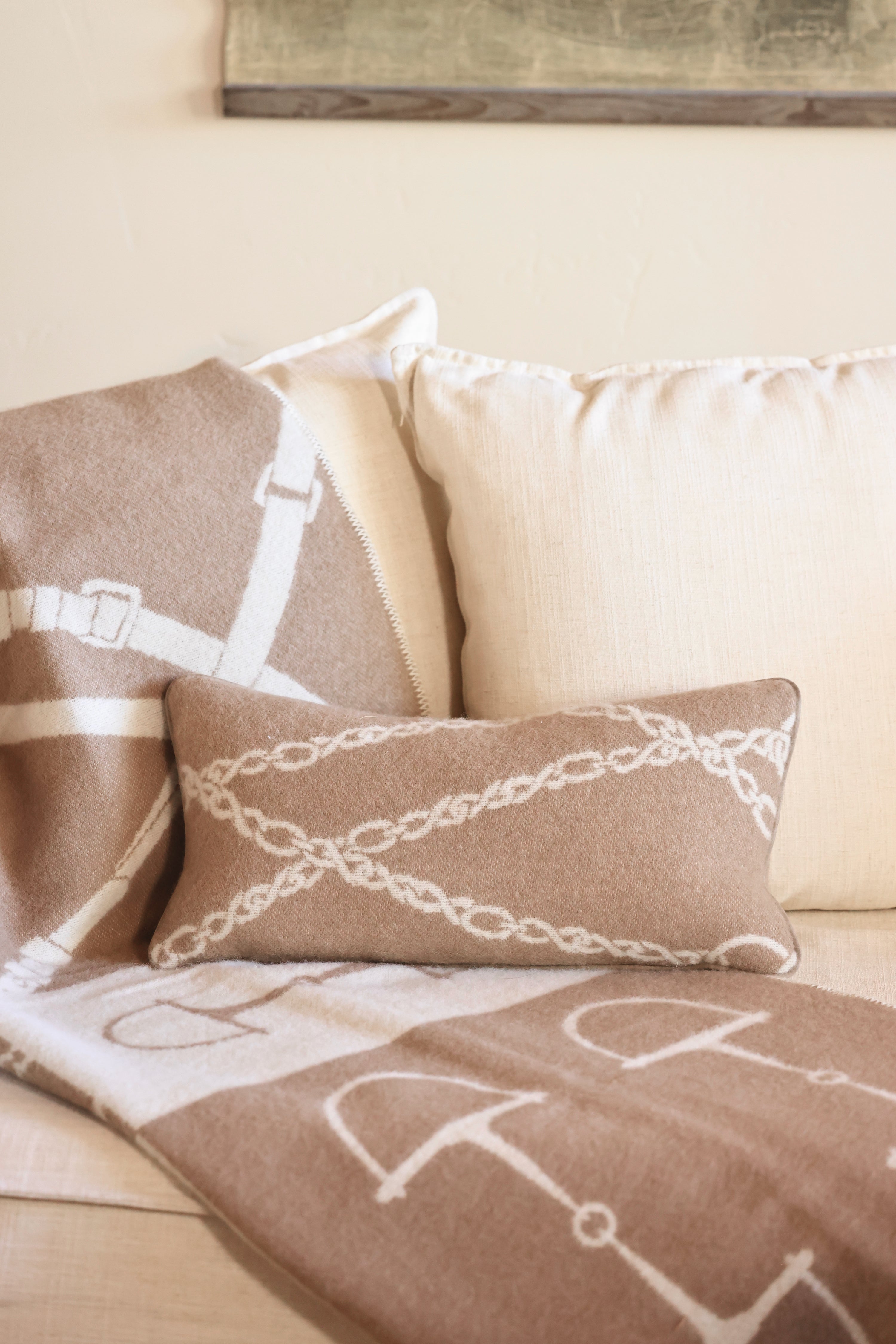 adamsbro stylish equestrian equine wool lumbar pillow Equine Lumbar Wool Pillow in Spice featuring a rich wool fabric with an elegant horse bit design, faux suede piping, and hidden zipper. A luxurious equestrian-inspired accent pillow perfect for home décor or bedding.