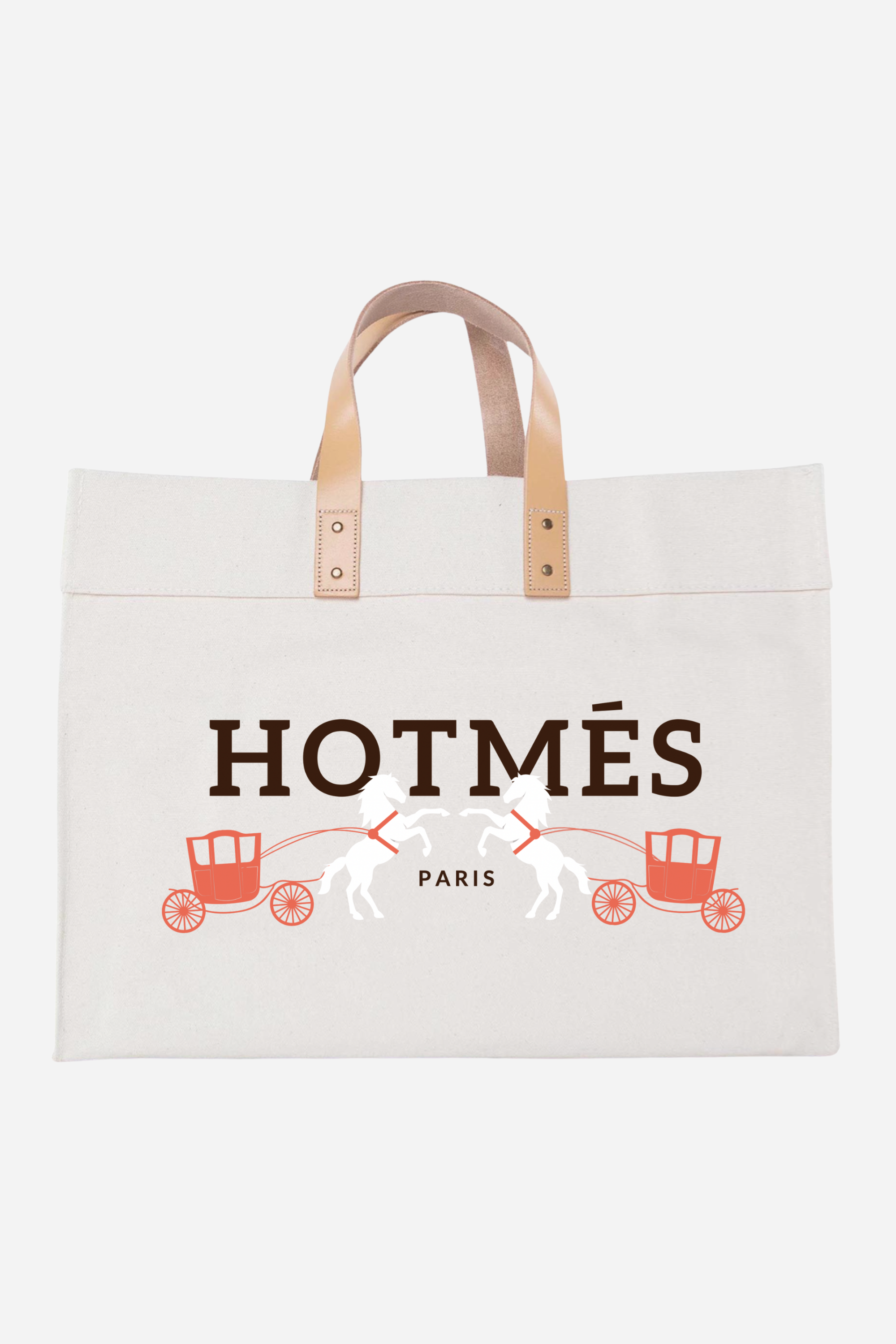 CB Station - A beige tote bag labeled "HOTMÉS" with an orange carriage design and white horses sits on a light carpet.