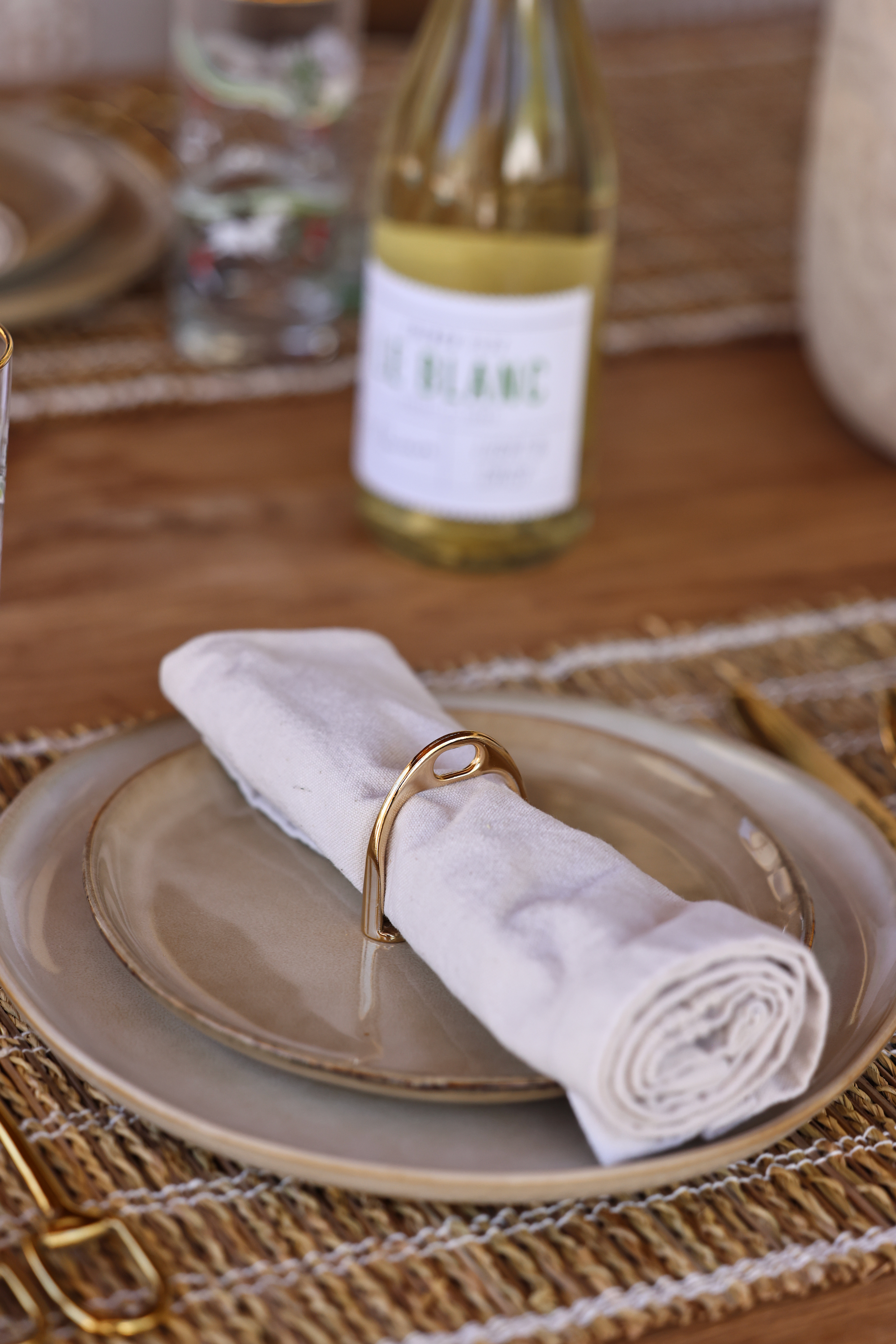 lilo collections stylish equestrian stirrup napkin ring set Gold Stirrup Napkin Ring Set featuring four polished brass stirrup-shaped rings with leather top closure for easy storage. Elegant equestrian-inspired table décor perfect for entertaining or gifting to horse lovers.