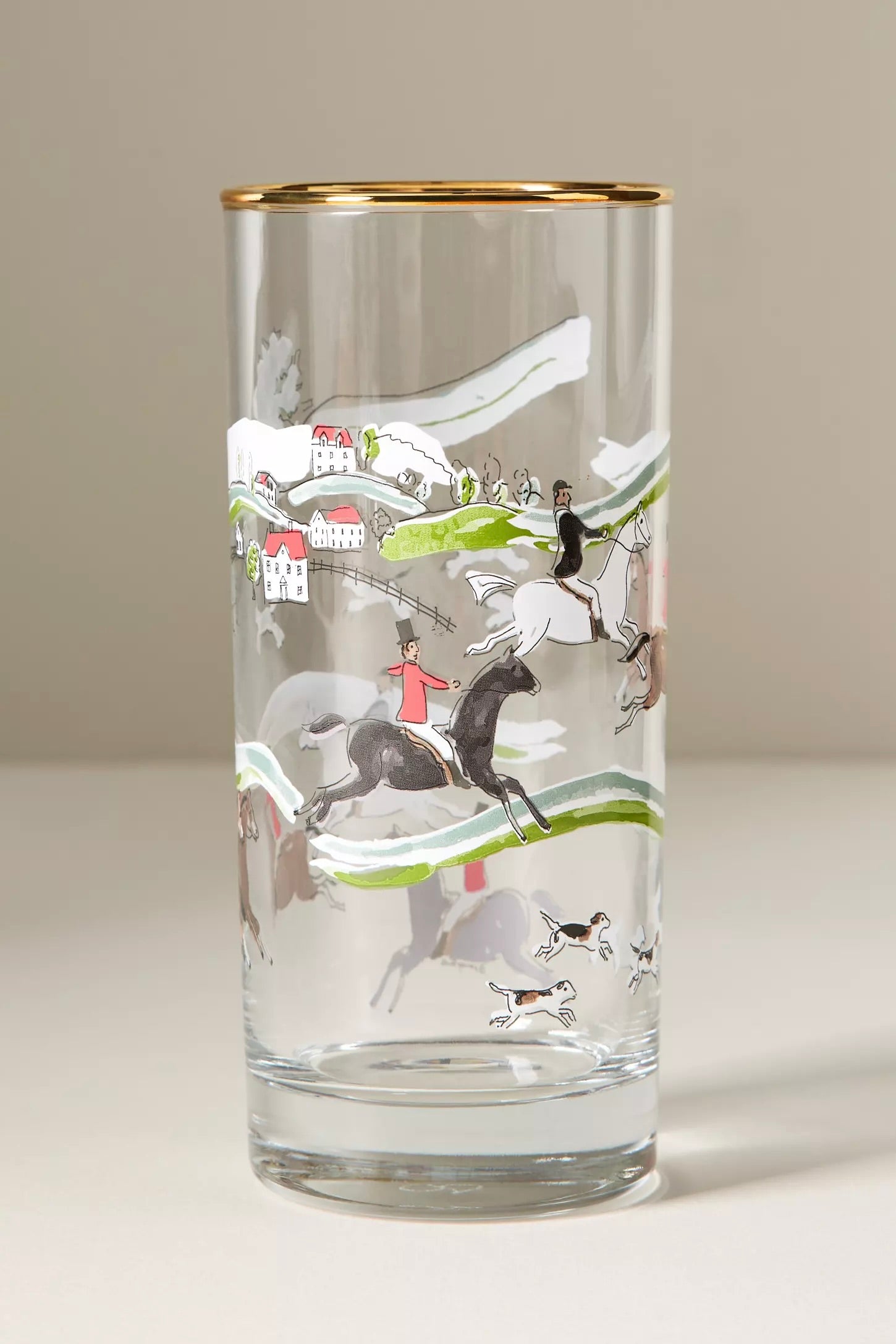 pomegranate inc stylish equestrian the hunt scene tall drinking glass set The Hunt Scene Drinking Glass Set featuring four tall glasses adorned with a detailed equestrian hunt scene and finished with elegant gold rims. A sophisticated horse-themed glassware set perfect for entertaining or gifting.